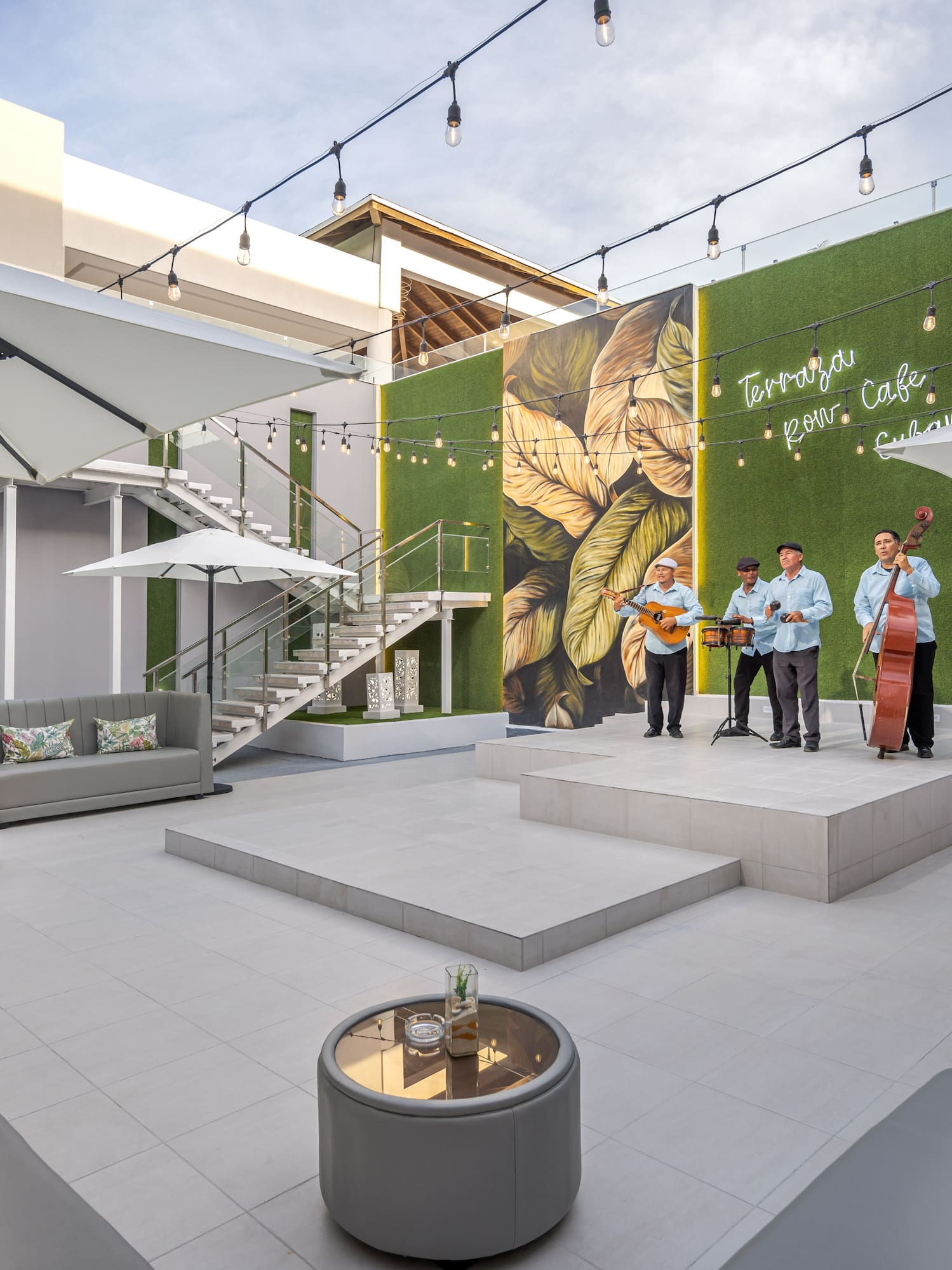 a group of men playing instruments on a stage