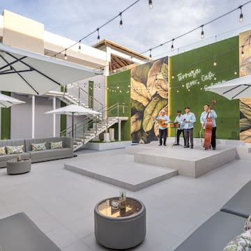 a group of men playing instruments on a stage