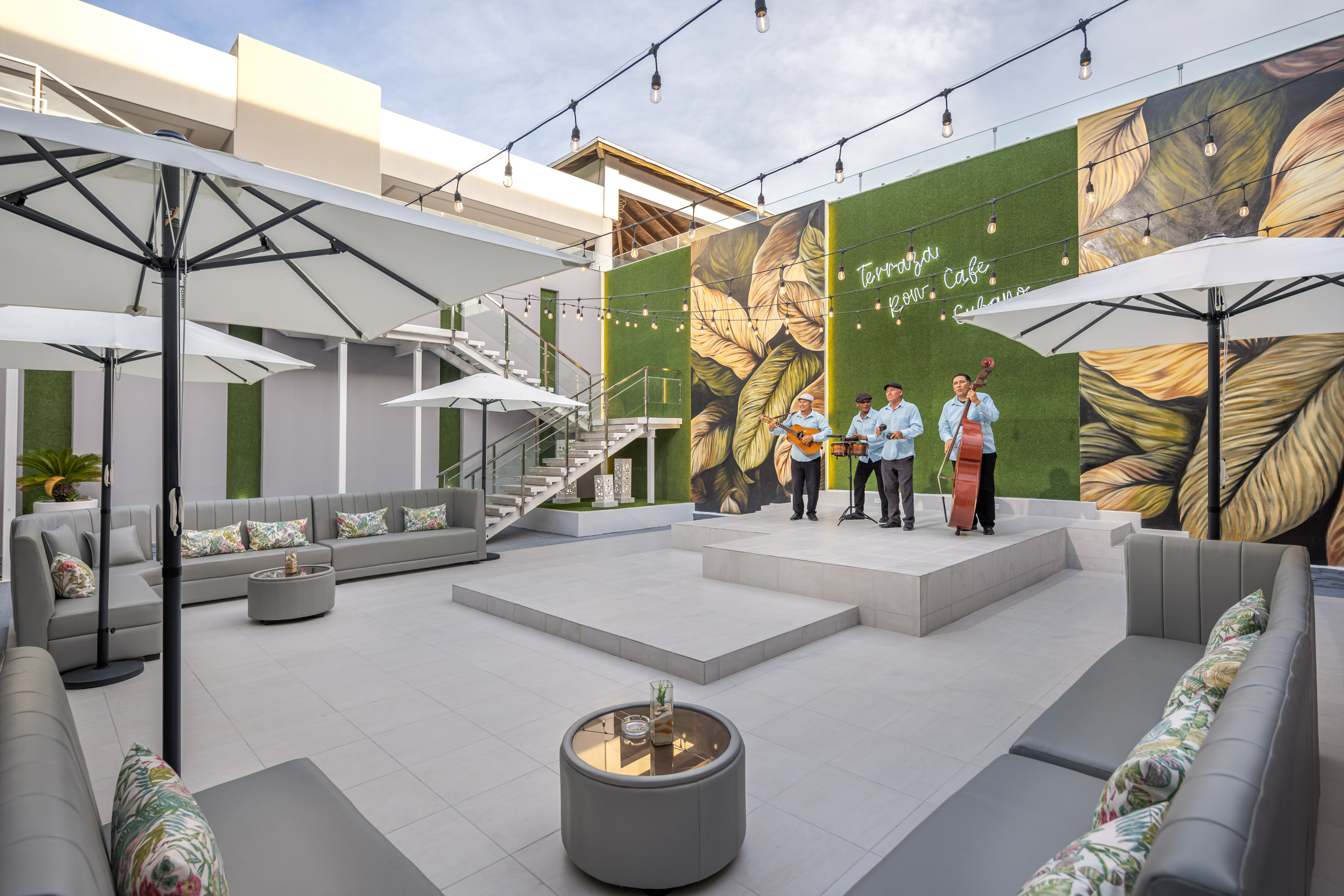 a group of men playing instruments on a stage