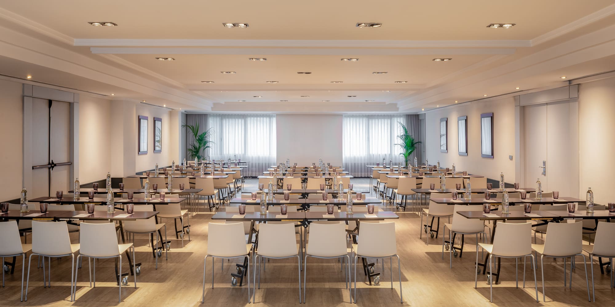 a room with tables and chairs