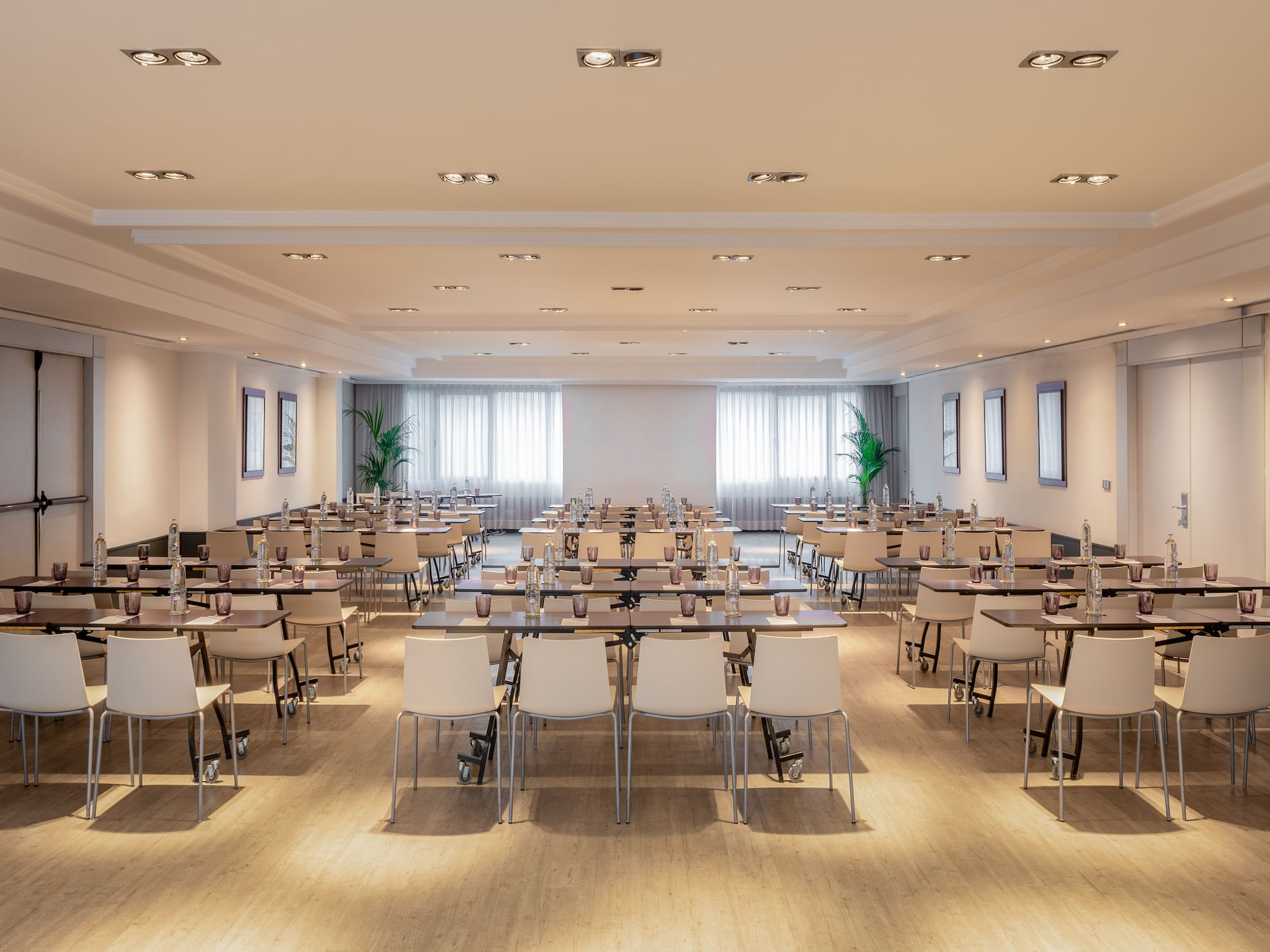 a room with tables and chairs