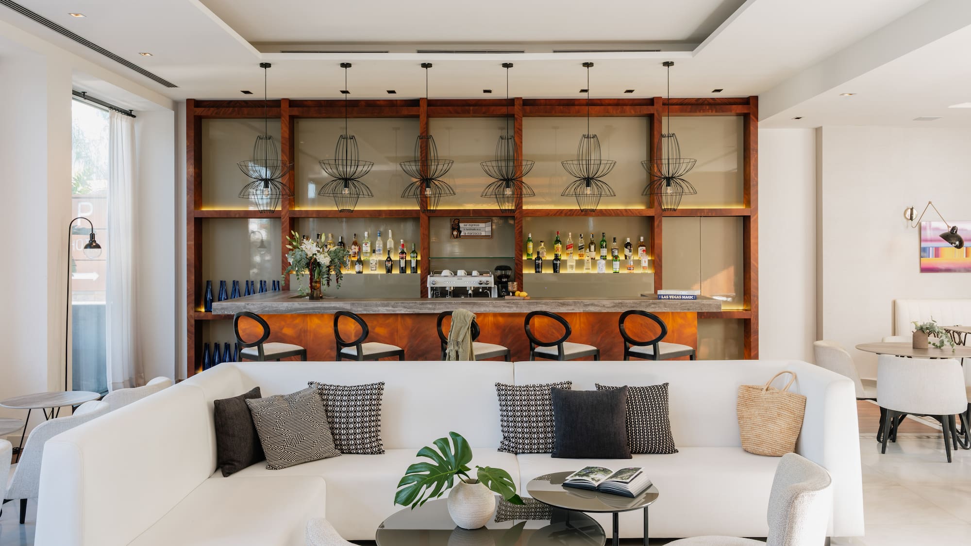 a room with a bar and a couch