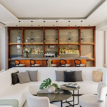 a room with a bar and a couch