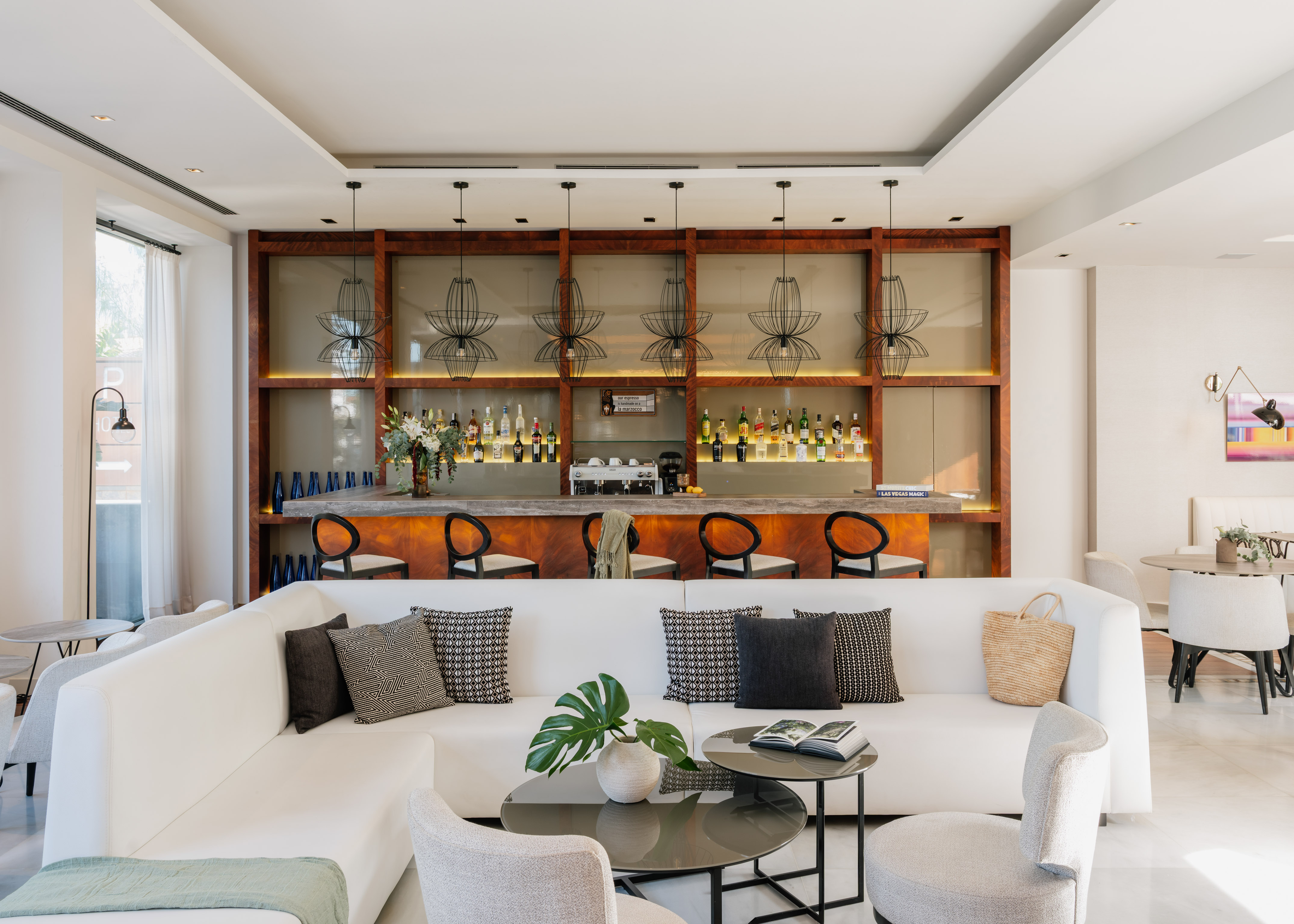 a room with a bar and a couch