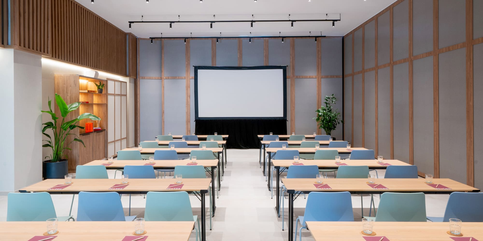 a room with tables and chairs