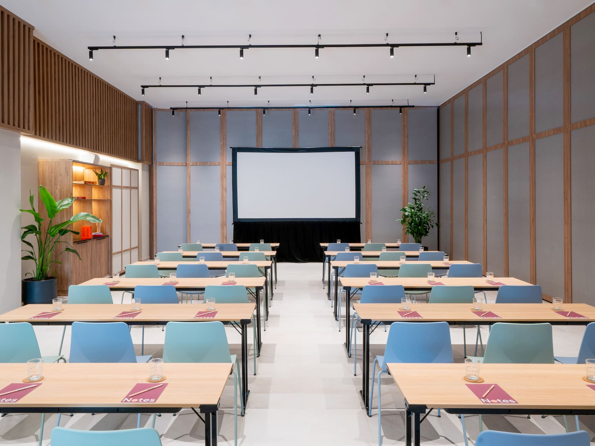 a room with tables and chairs