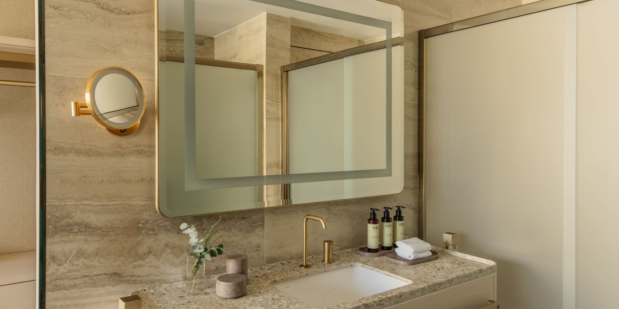 a bathroom with a mirror and sink