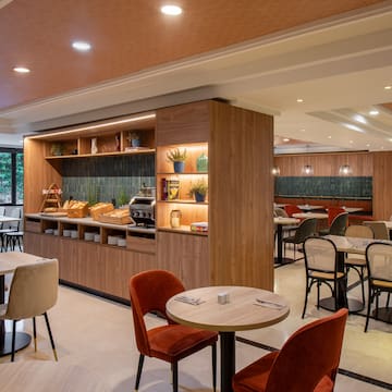 a room with tables and chairs