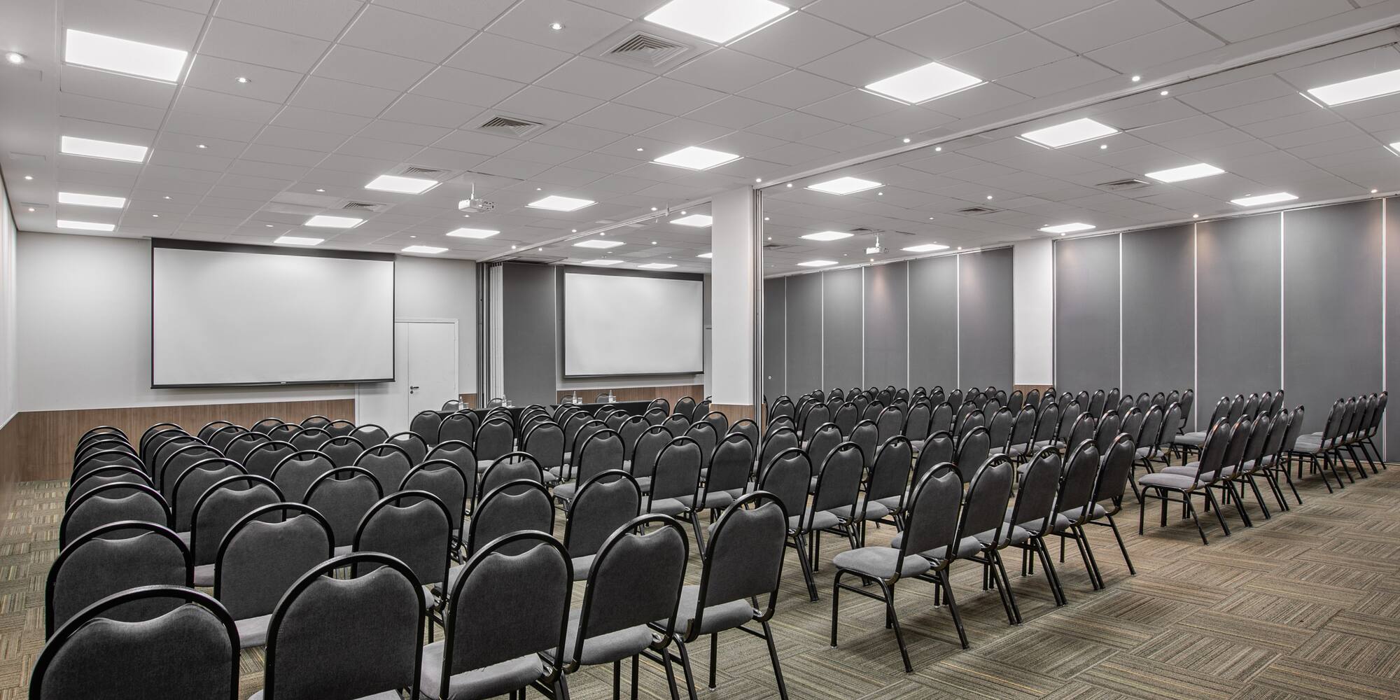 a room with rows of chairs