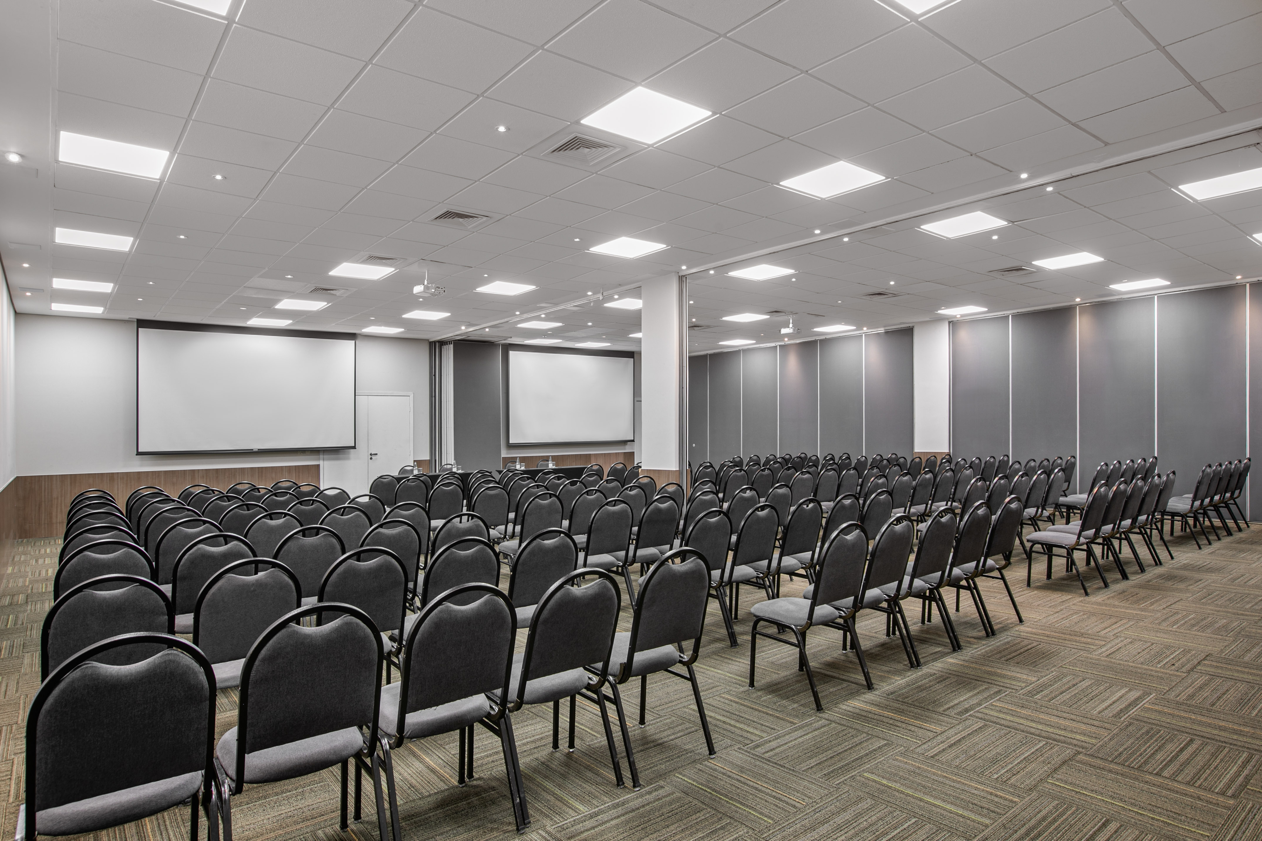 a room with rows of chairs