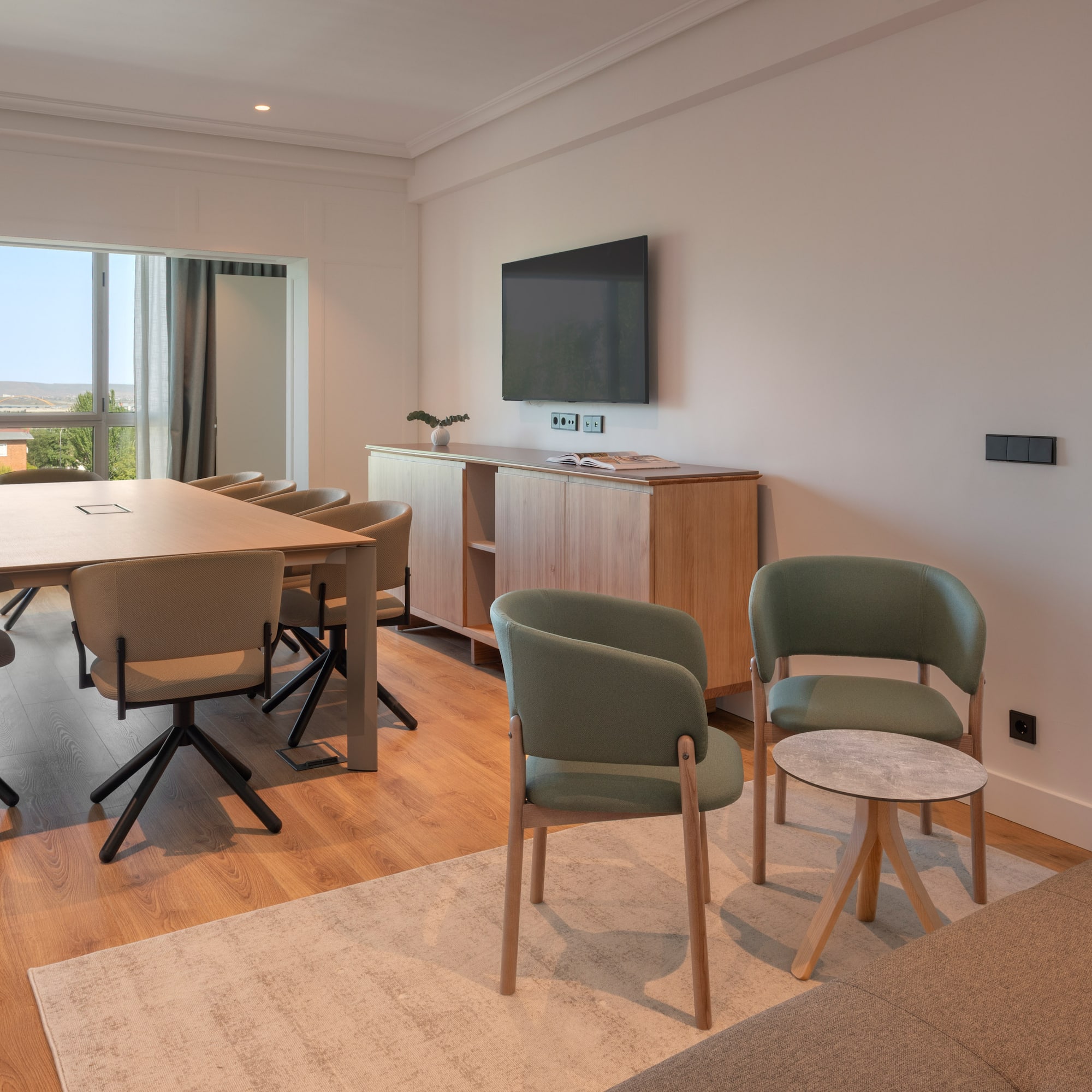 a room with a table and chairs