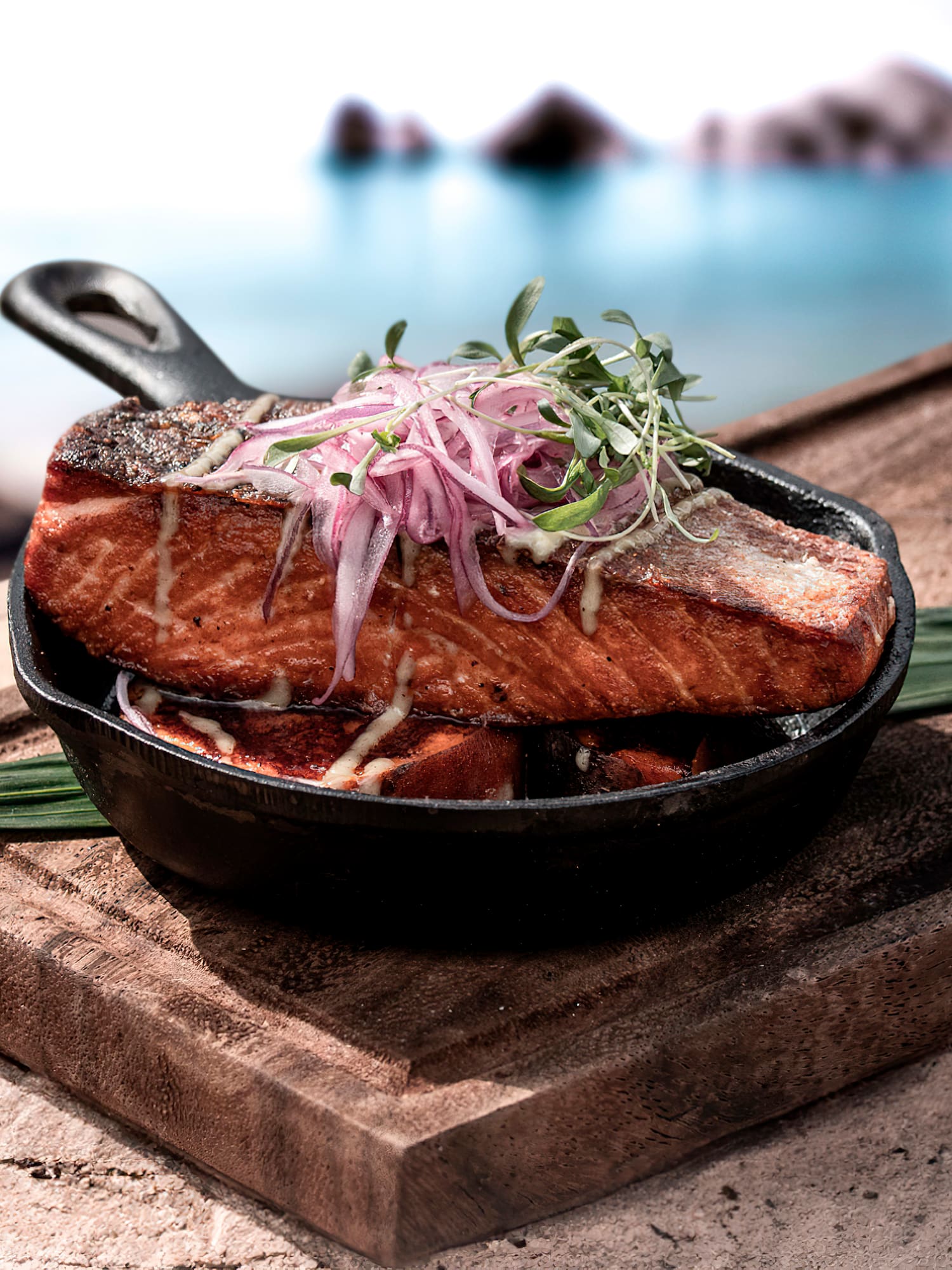 a pan of food on a cutting board