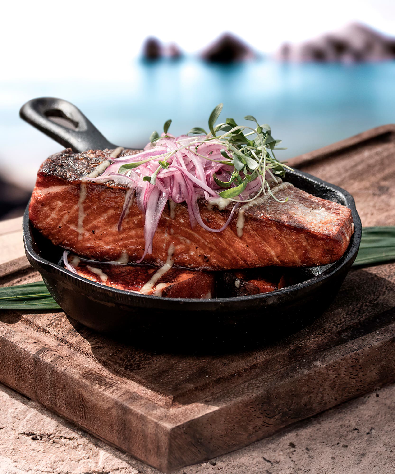 a pan of food on a cutting board