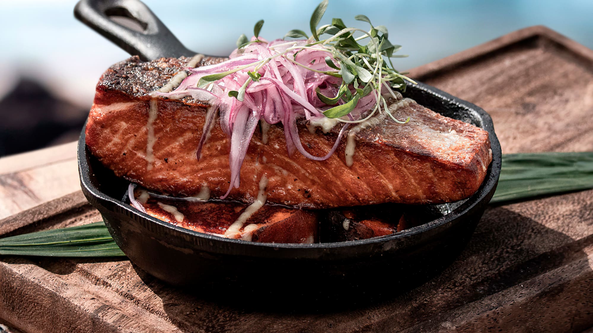 a pan of food on a cutting board