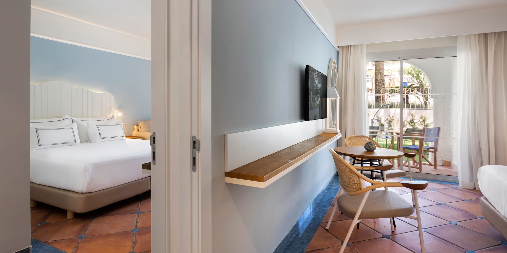 a room with a bed and a table