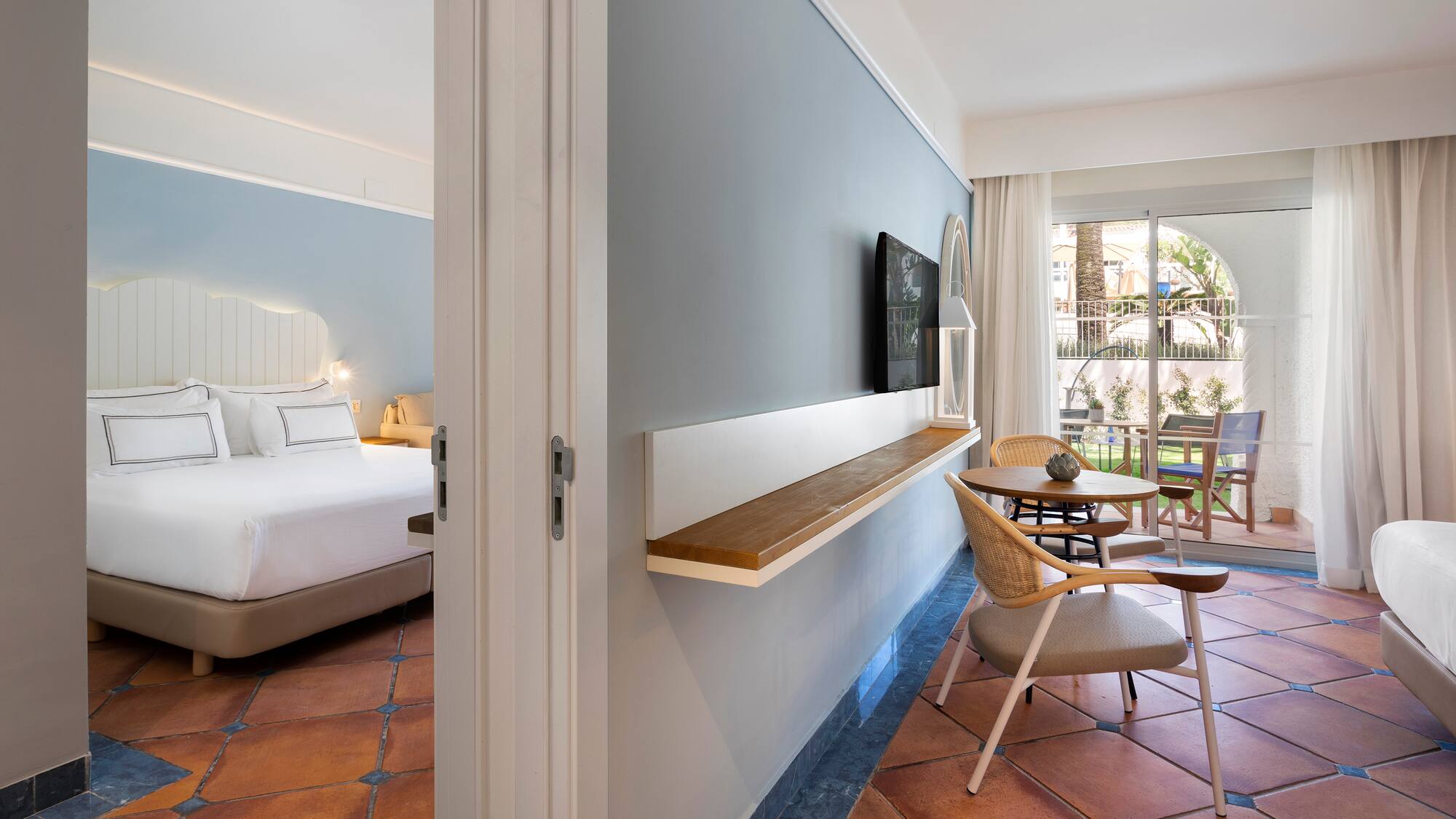 a room with a bed and a table