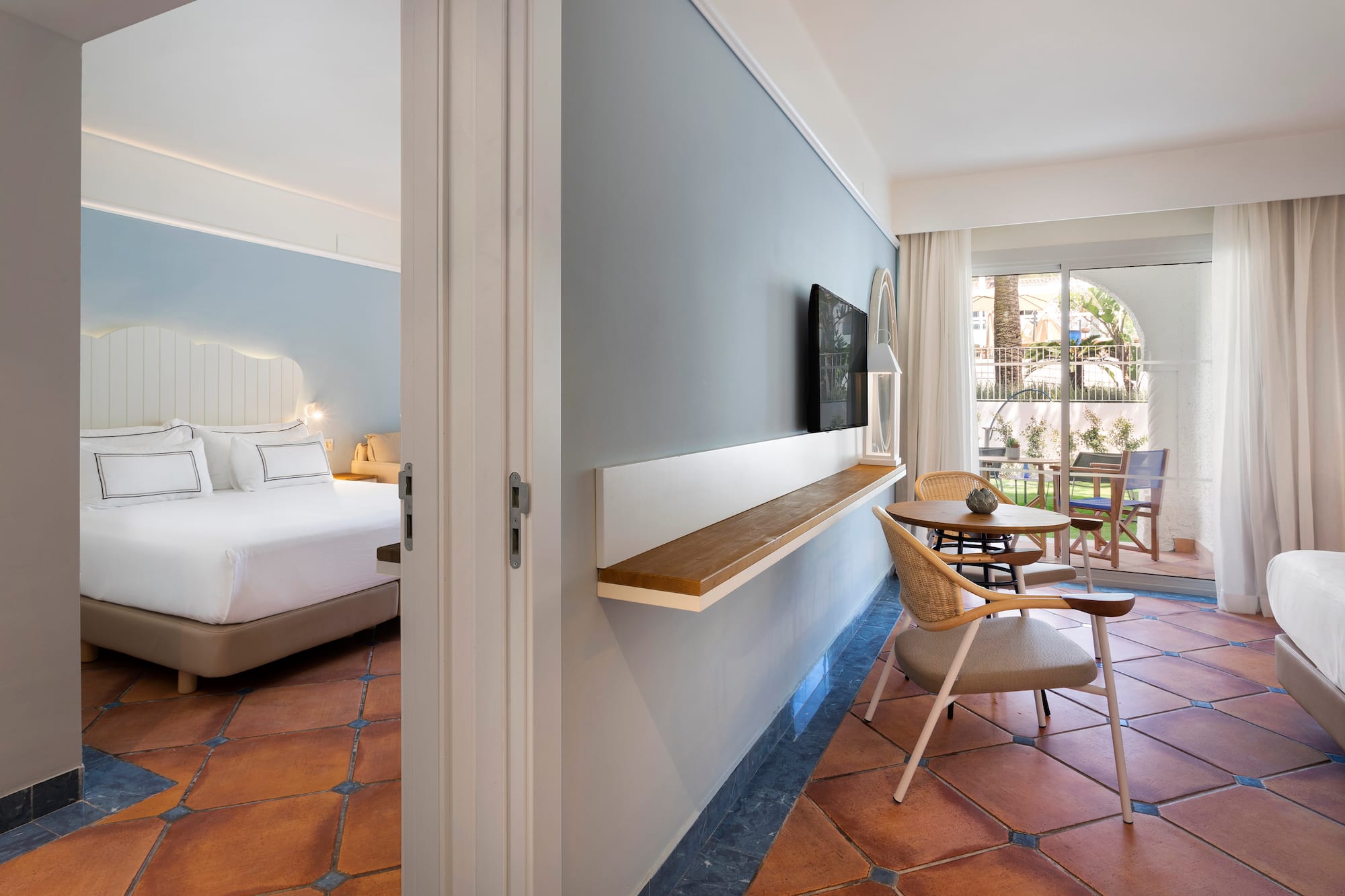 a room with a bed and a table