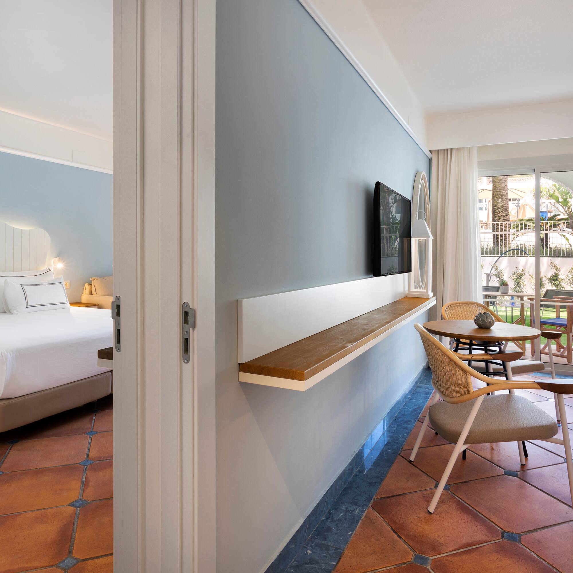 a room with a bed and a table