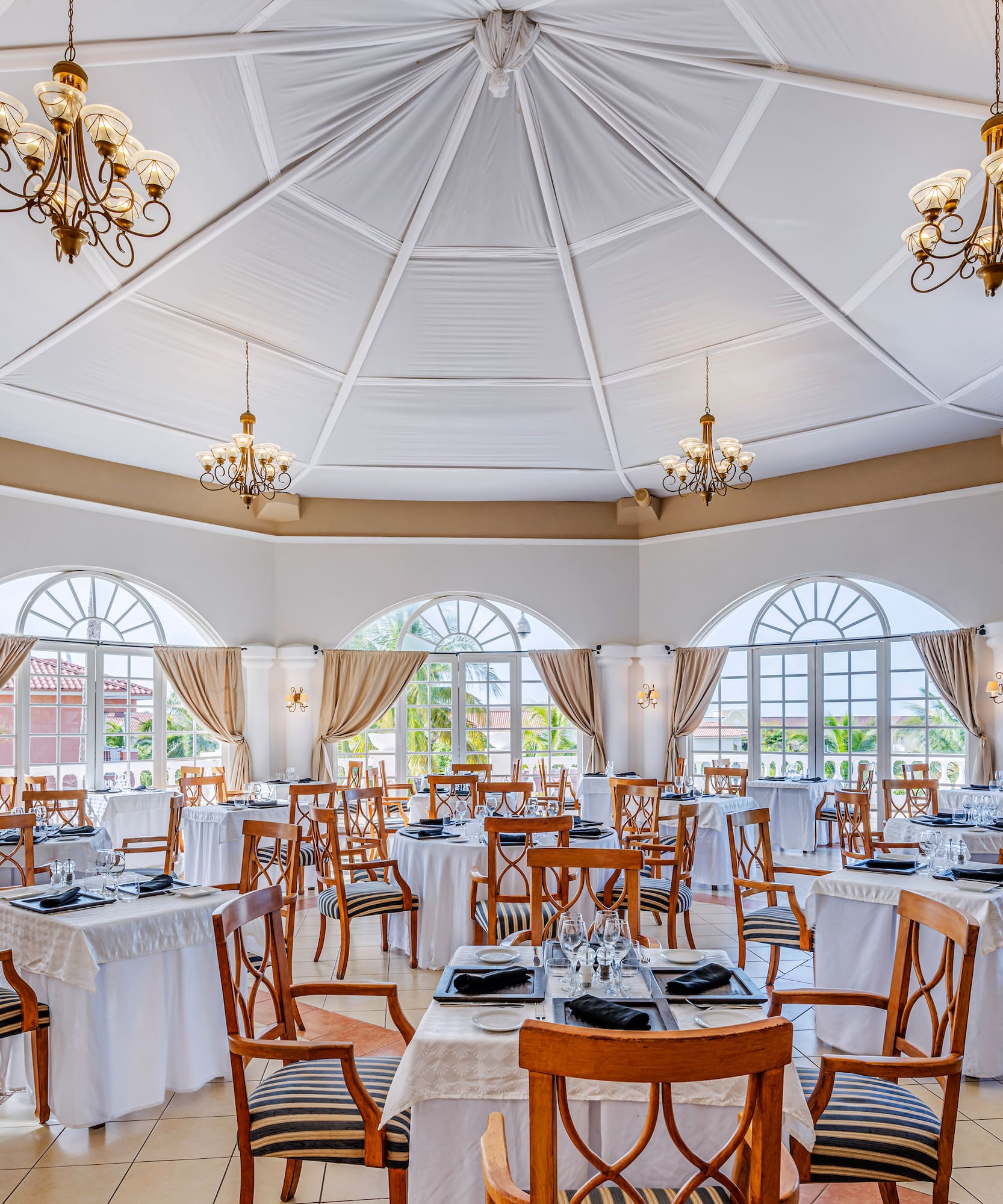 a room with tables and chairs