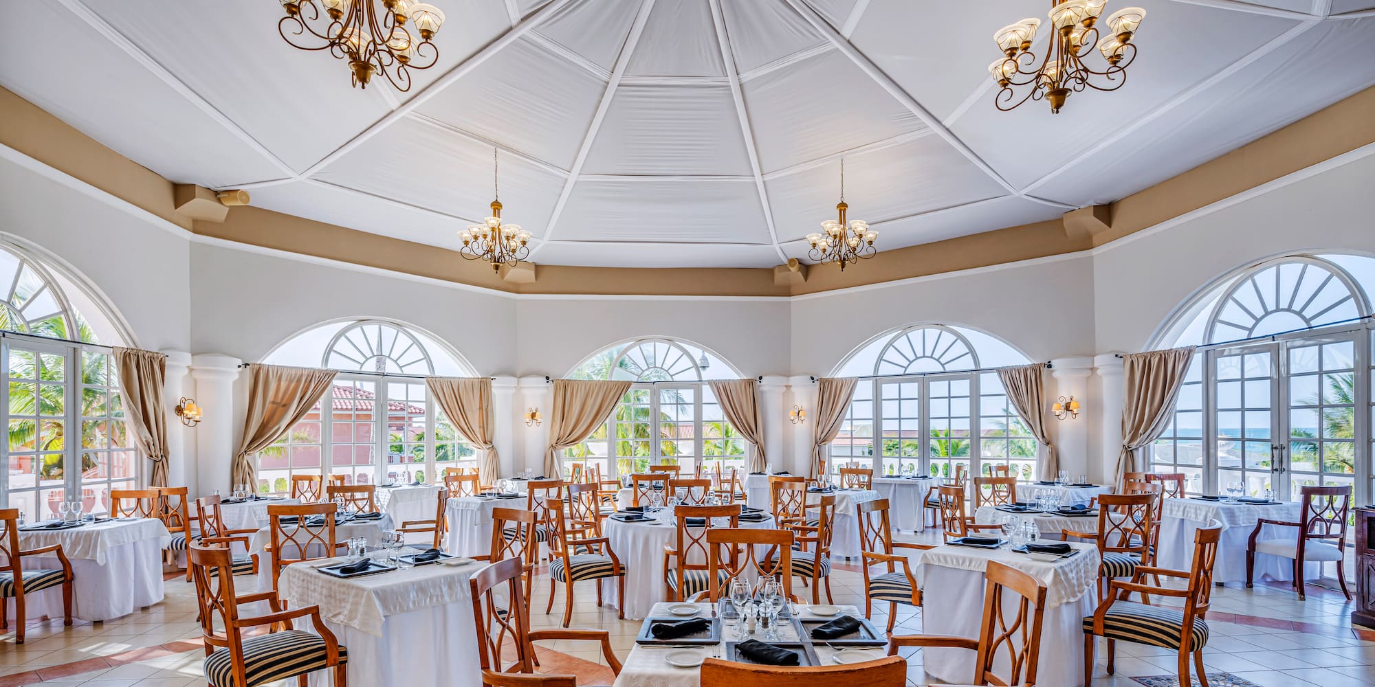 a room with tables and chairs