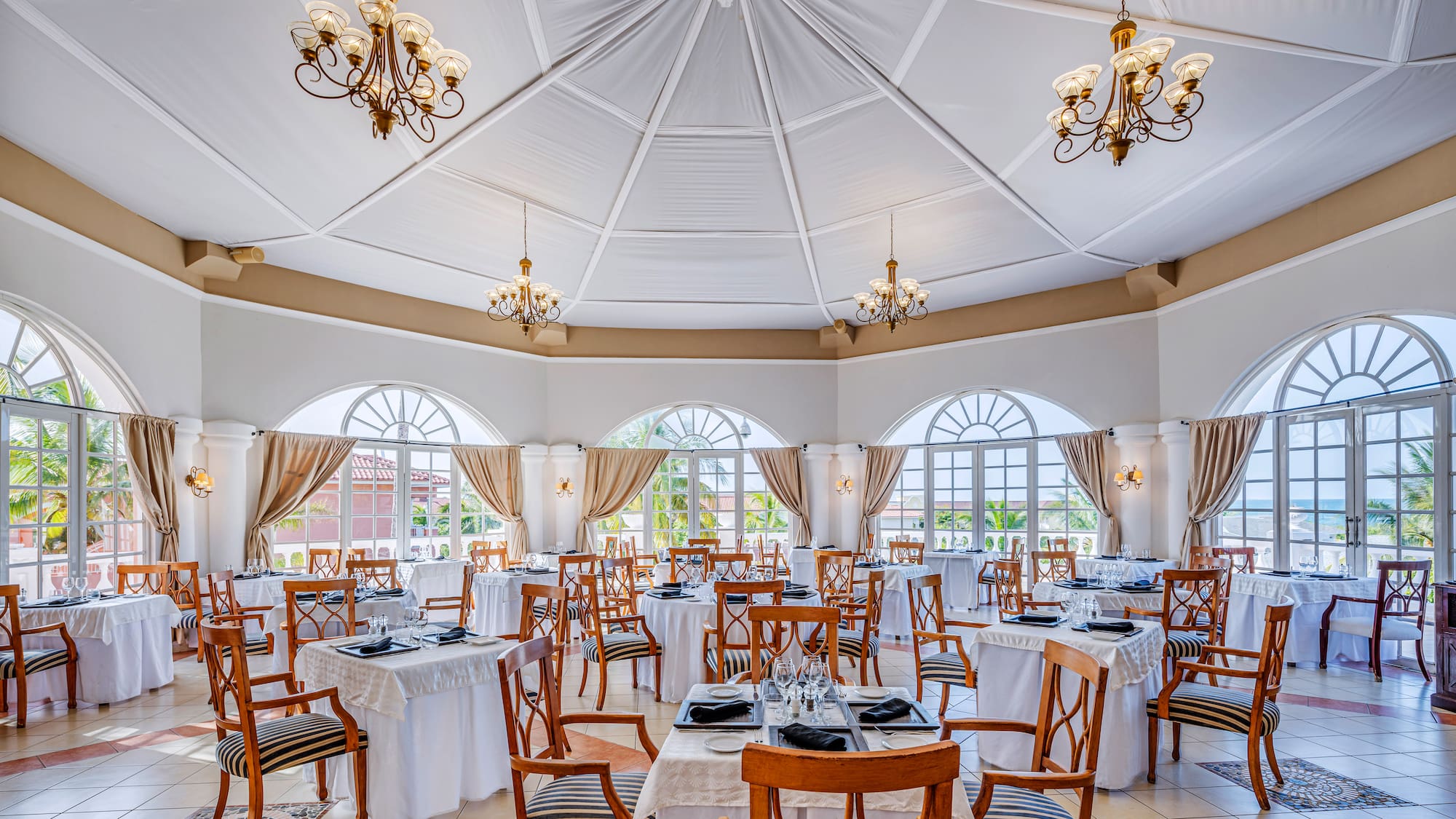 a room with tables and chairs