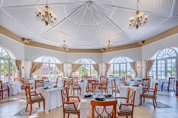 a room with tables and chairs