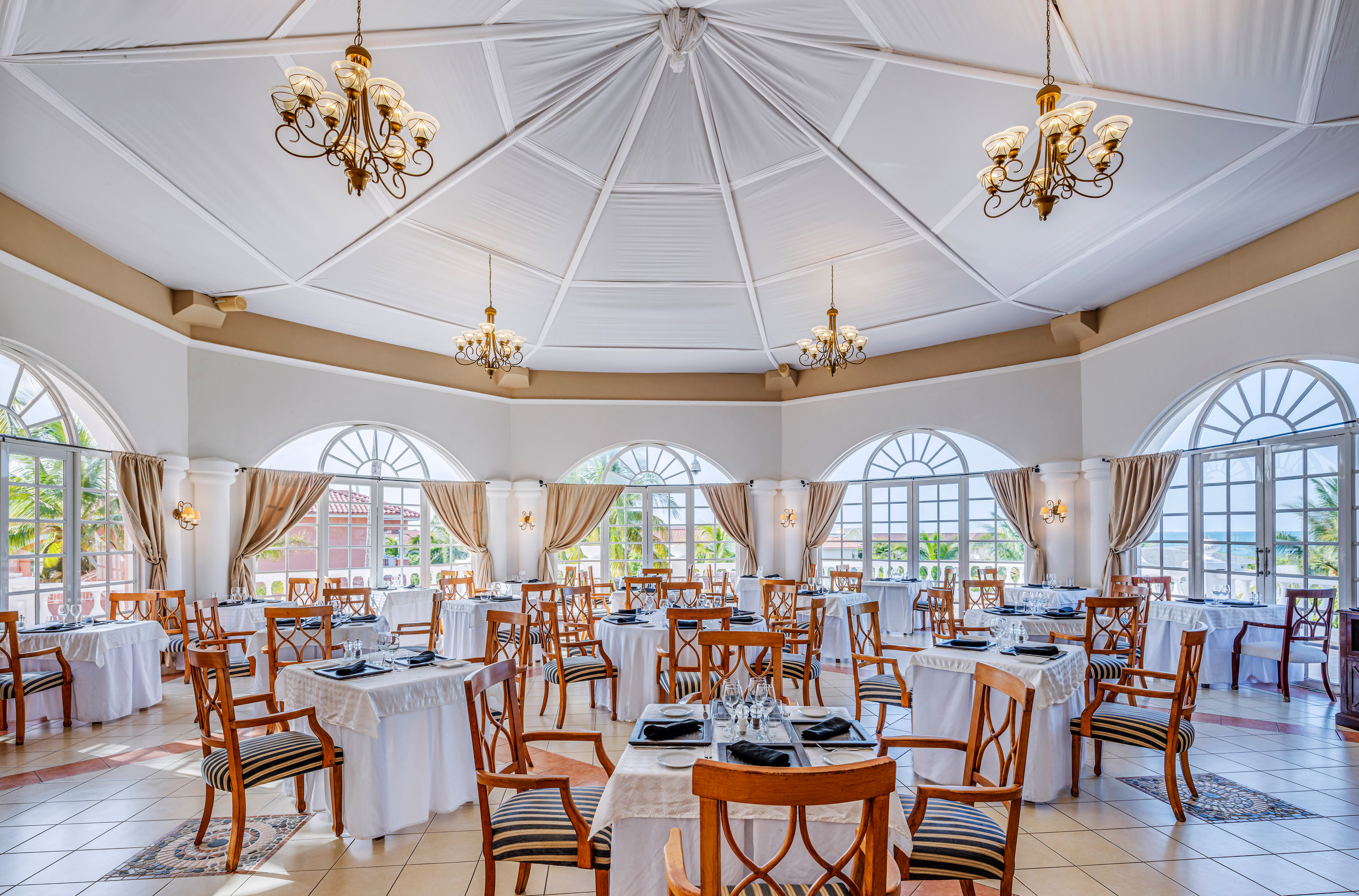 a room with tables and chairs