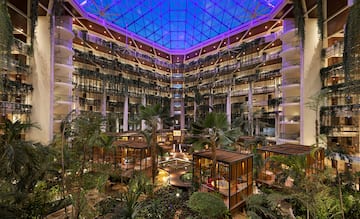 a building with trees and plants