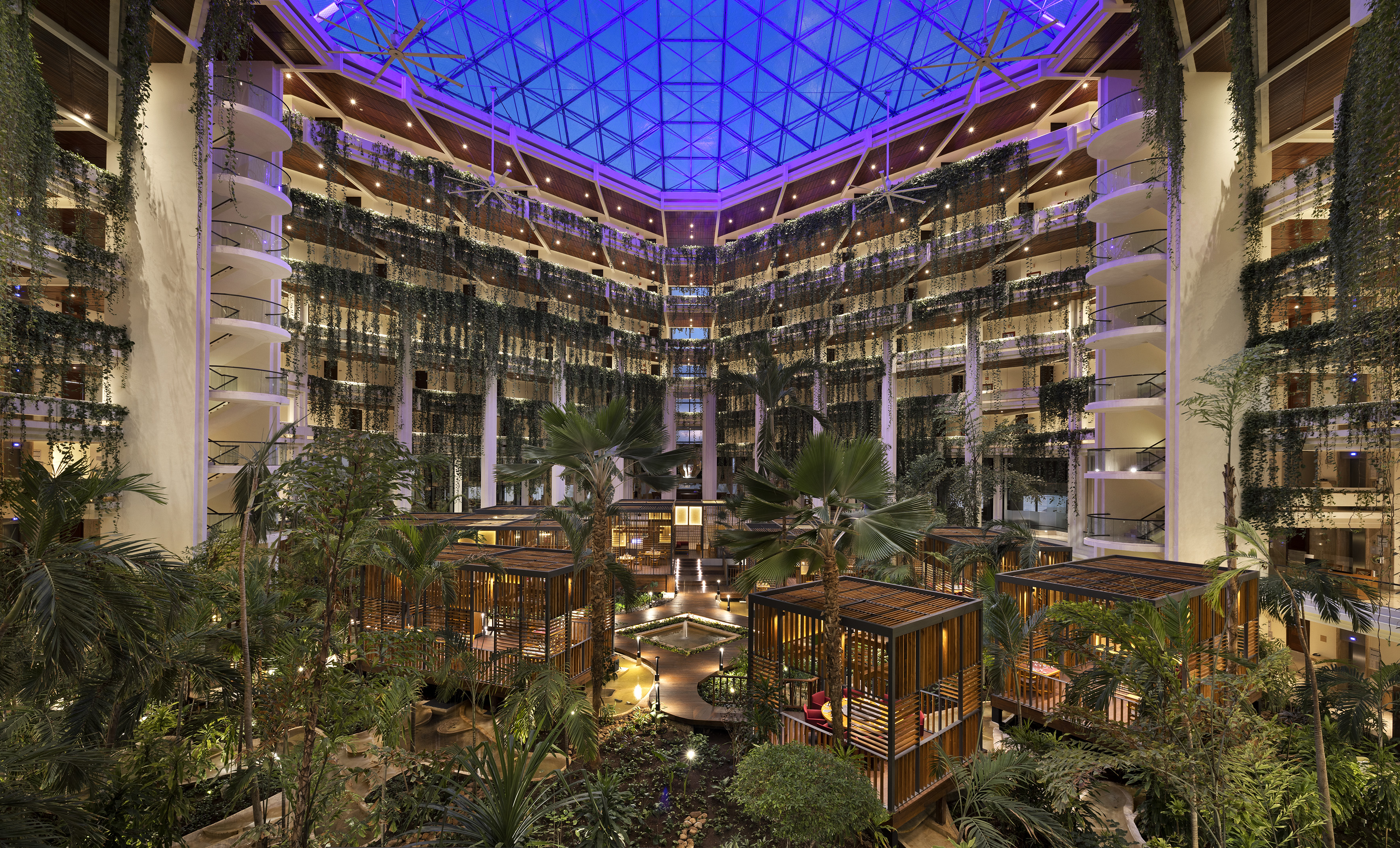 a building with trees and plants