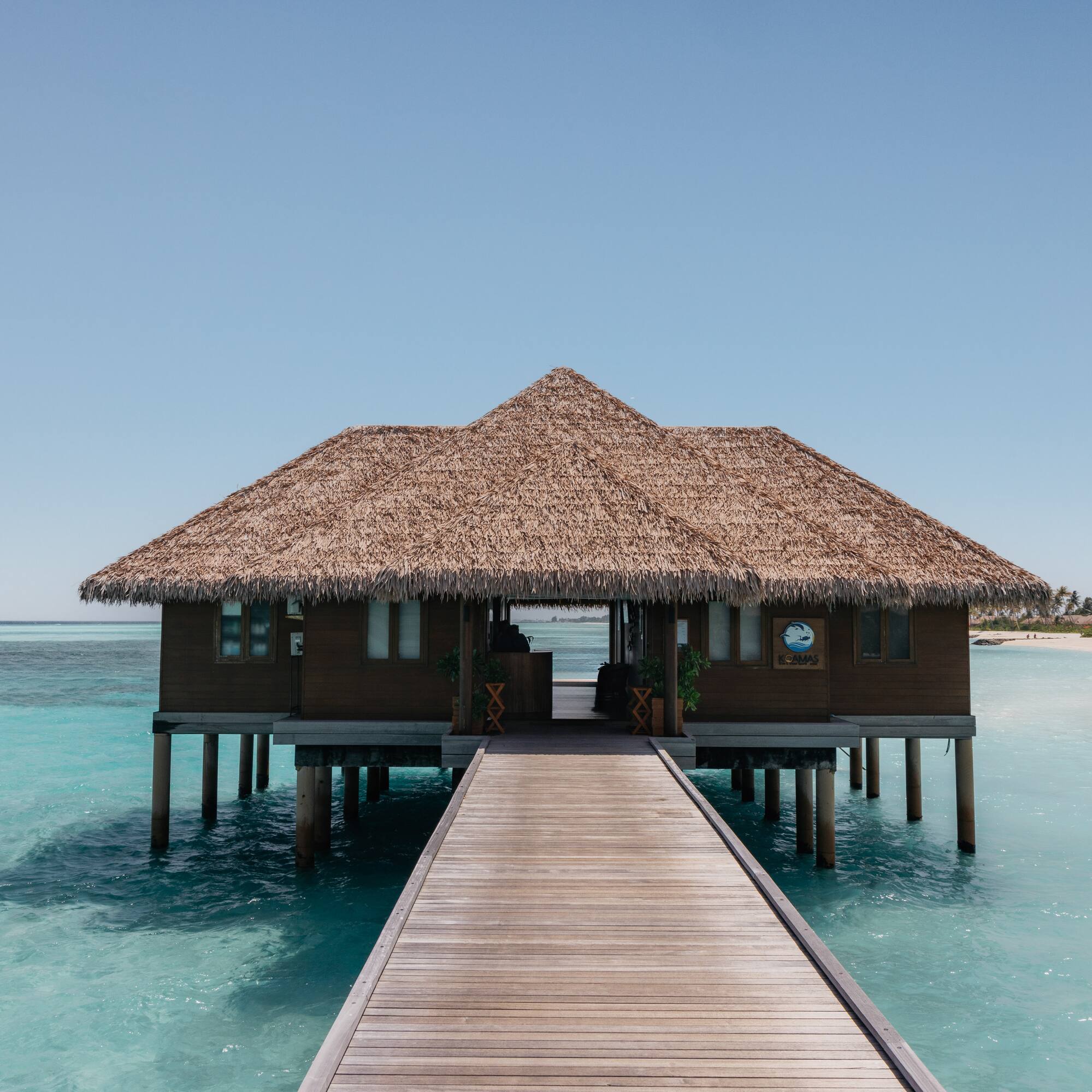 a building on stilts in the water