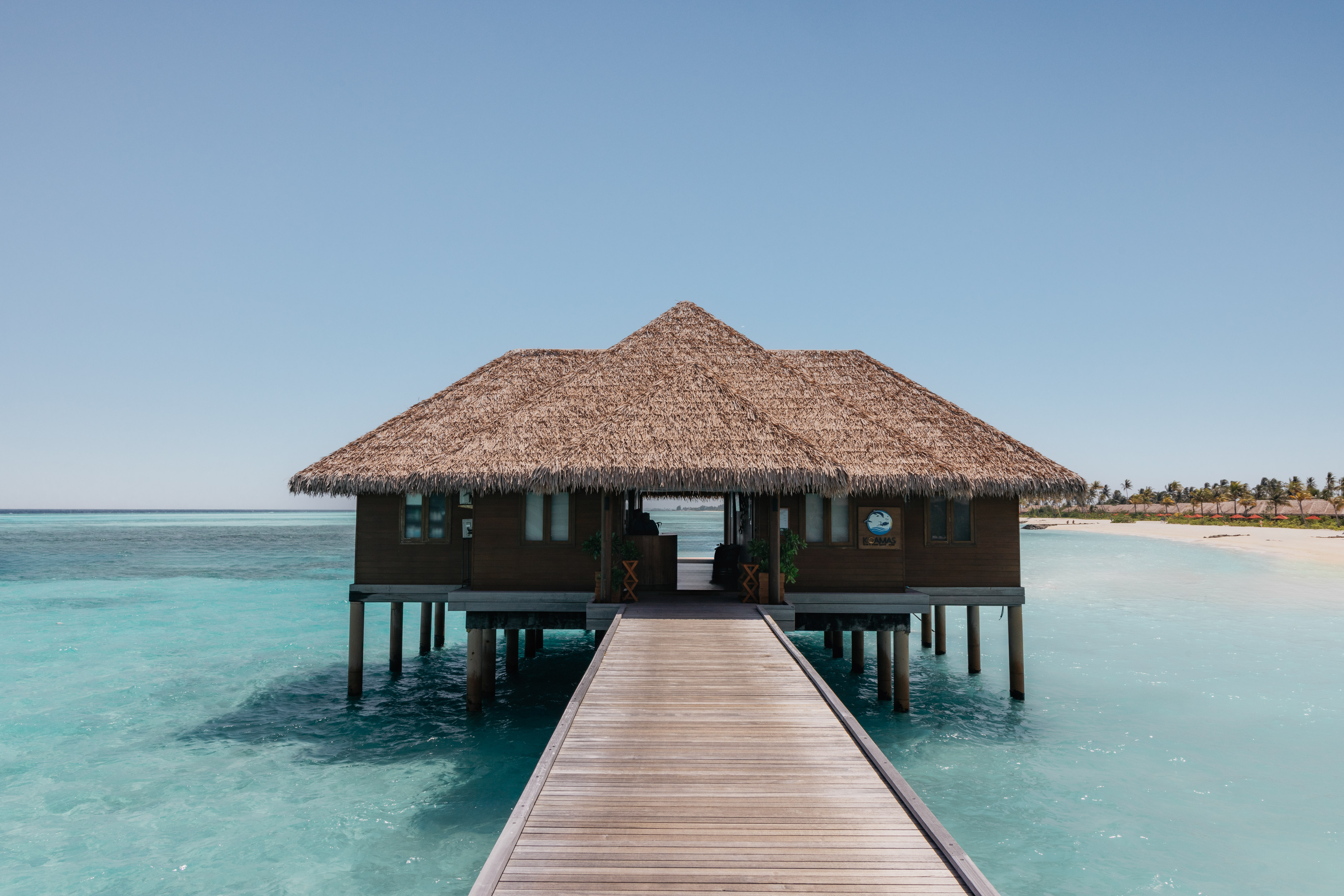 a building on stilts in the water