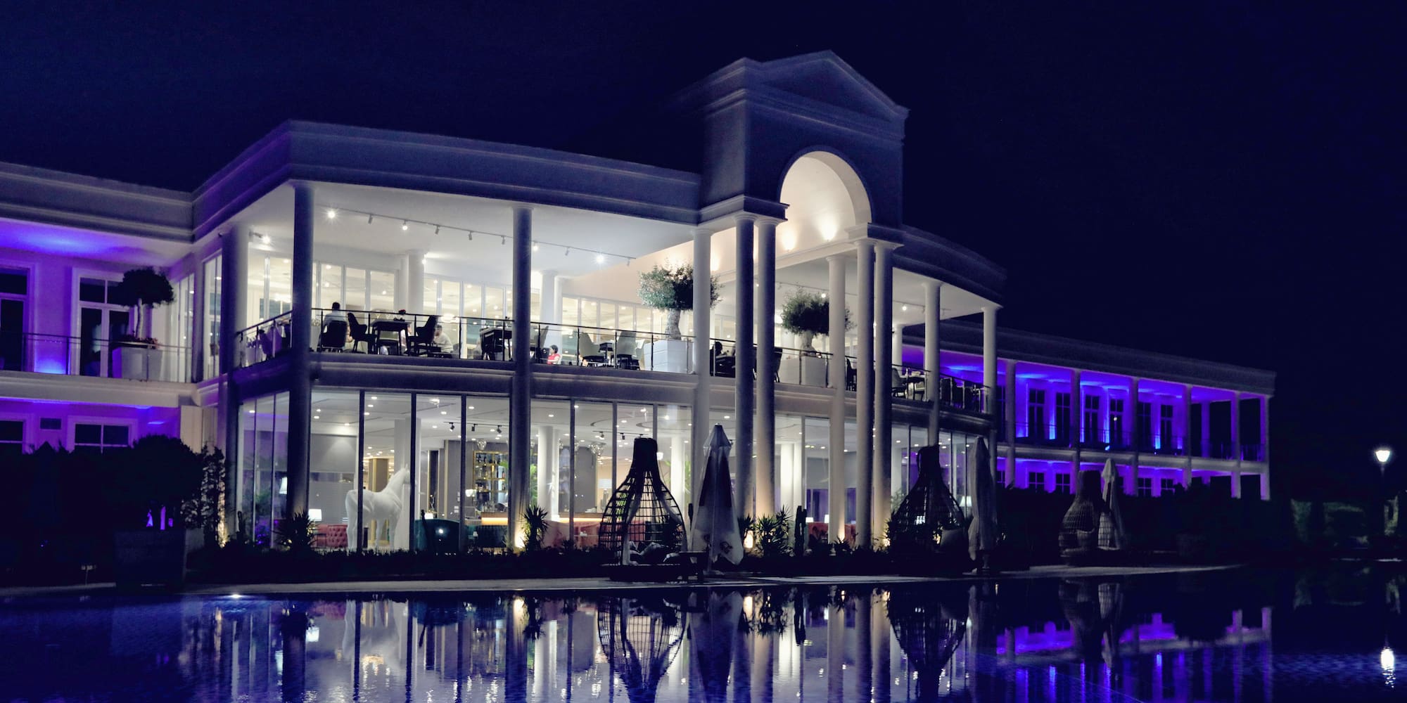 a building with purple lights