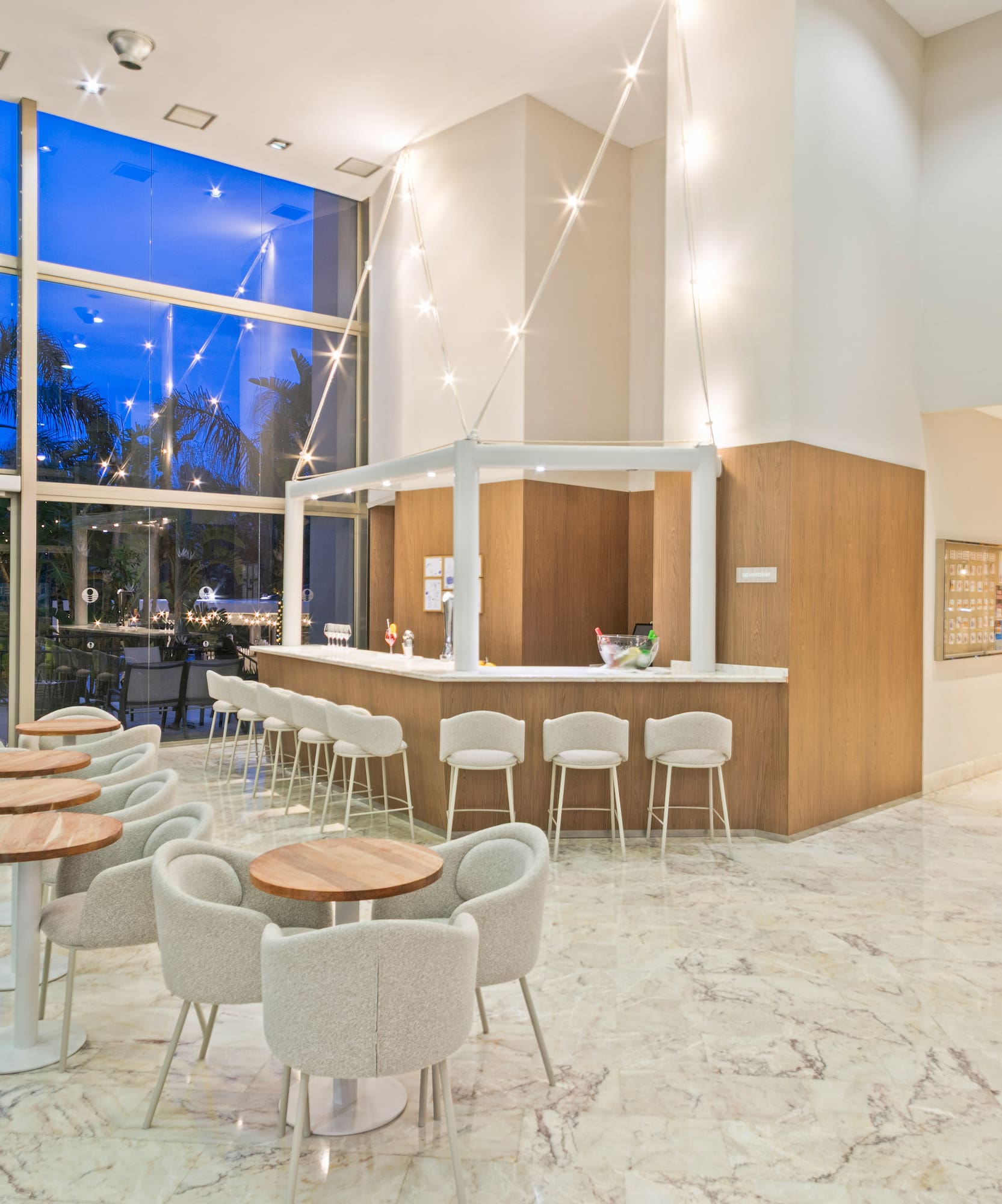 a room with tables and chairs