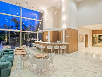 a room with tables and chairs