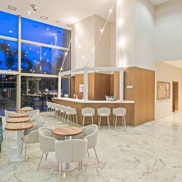 a room with tables and chairs