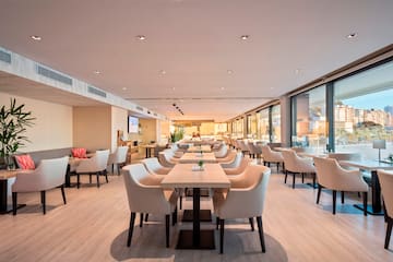 a room with tables and chairs