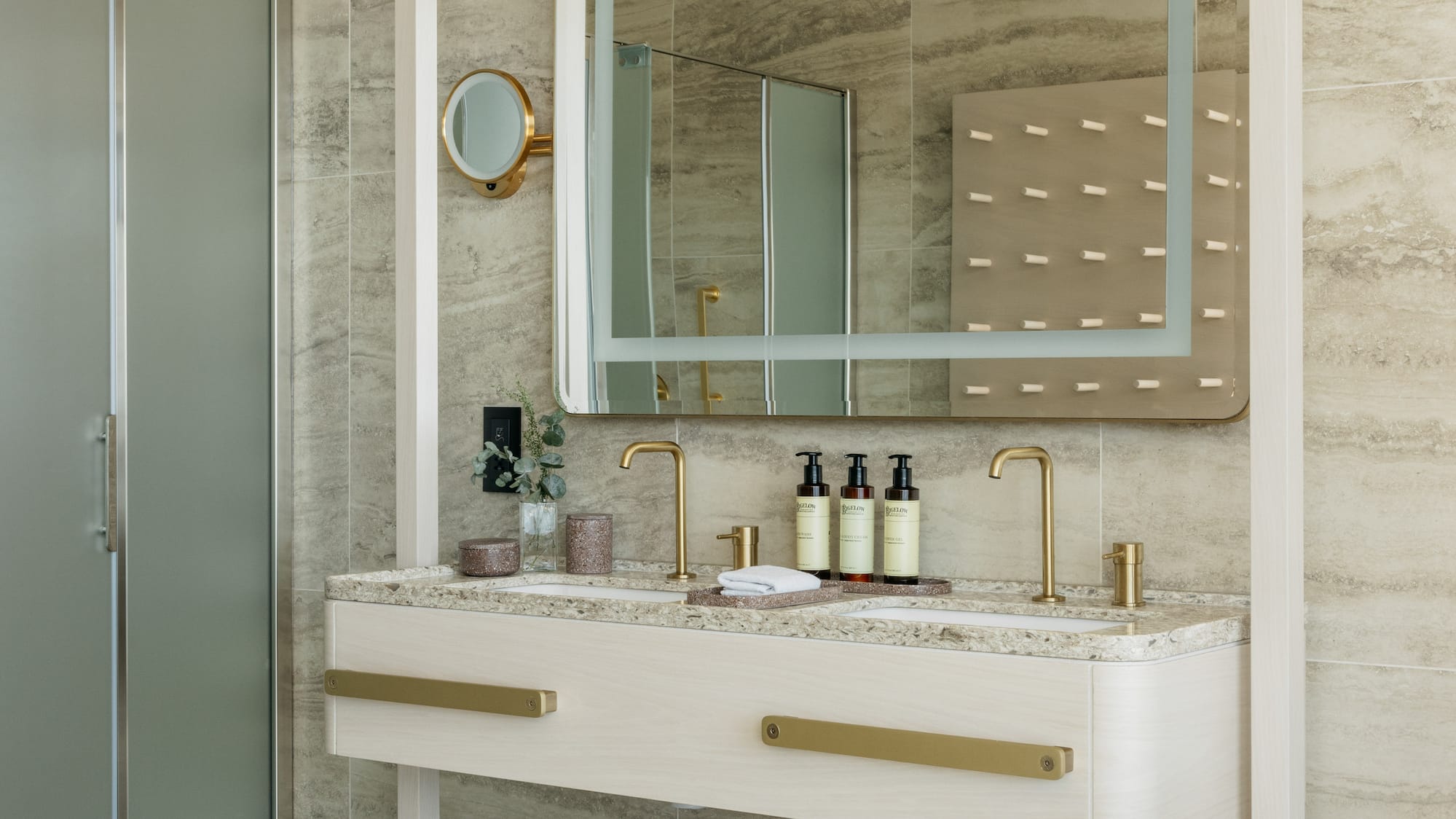 a bathroom with a mirror and sink