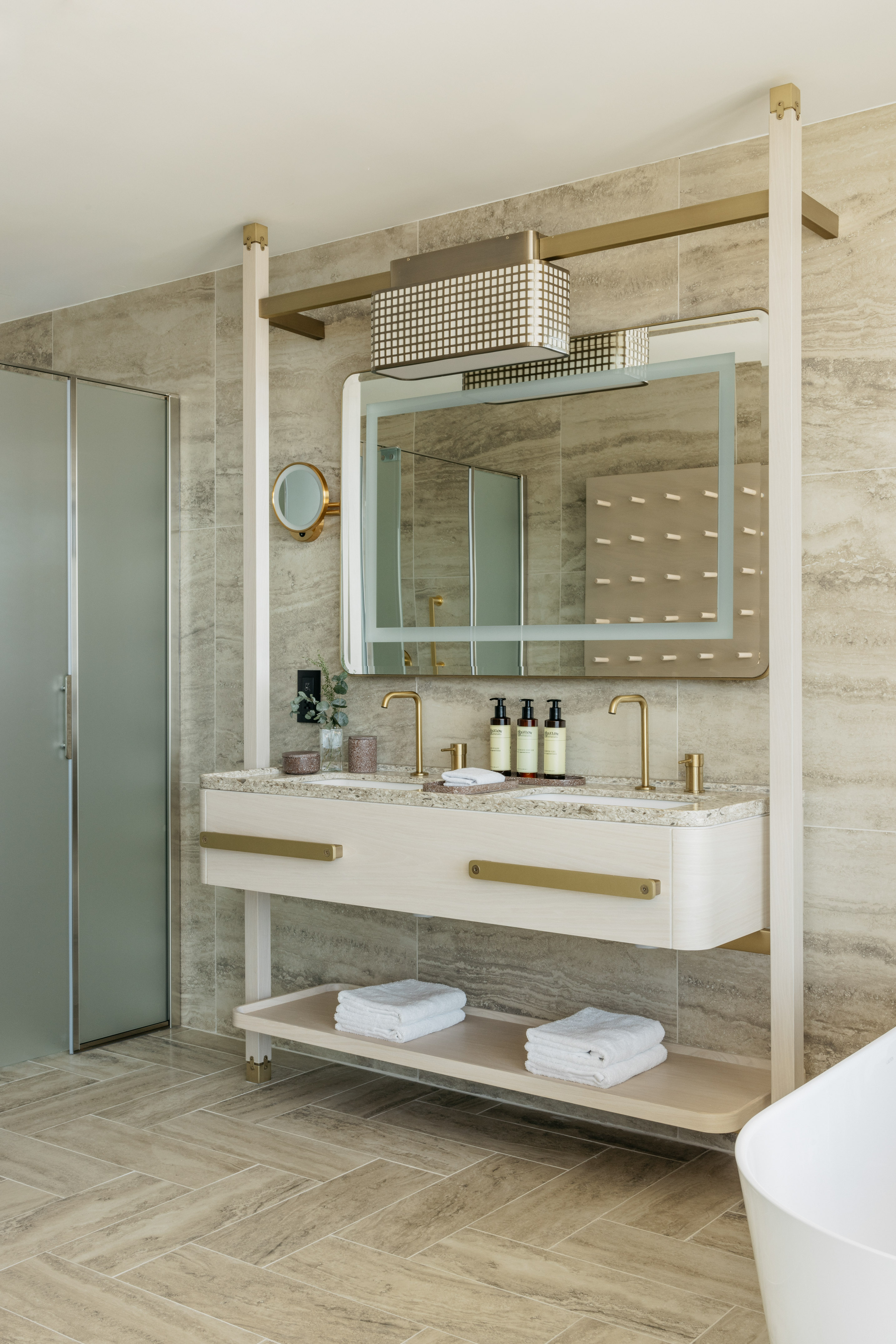 a bathroom with a mirror and sink