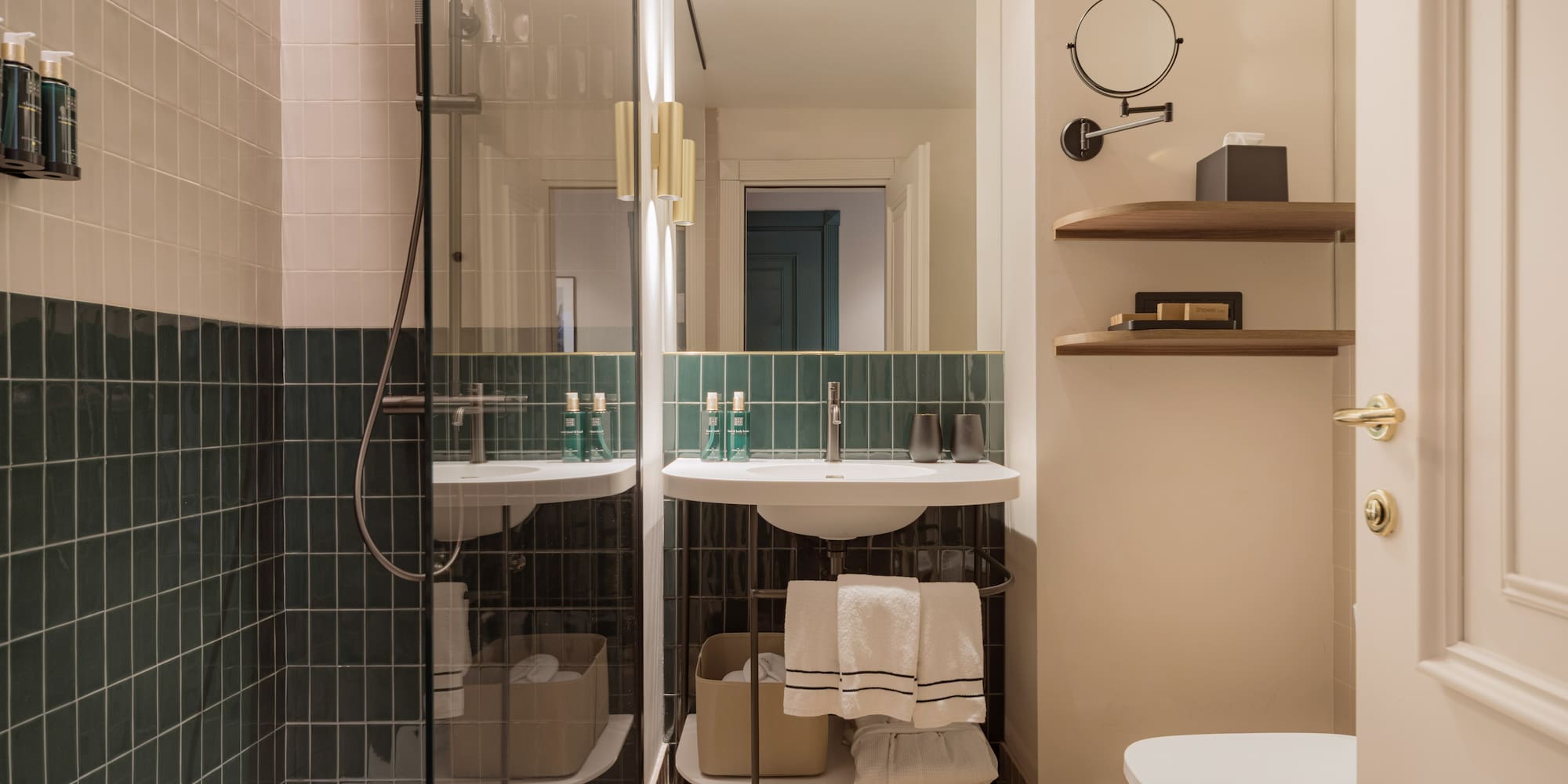 a bathroom with a shower and sink