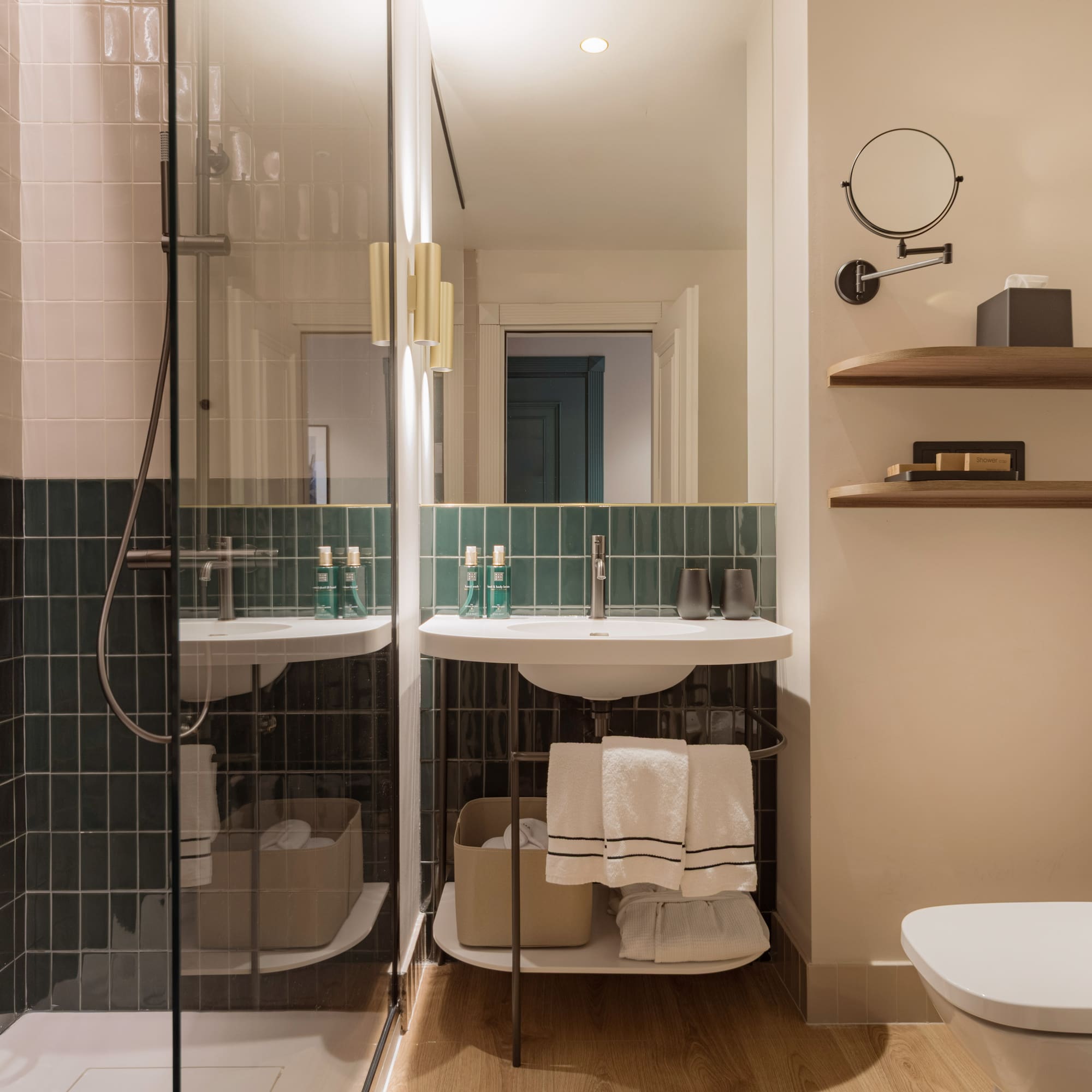 a bathroom with a shower and sink