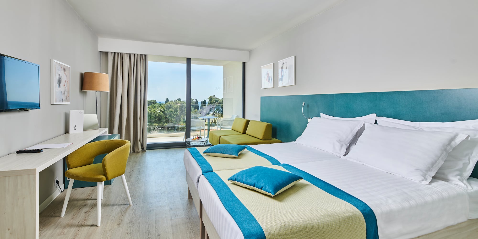 a room with a bed and a desk