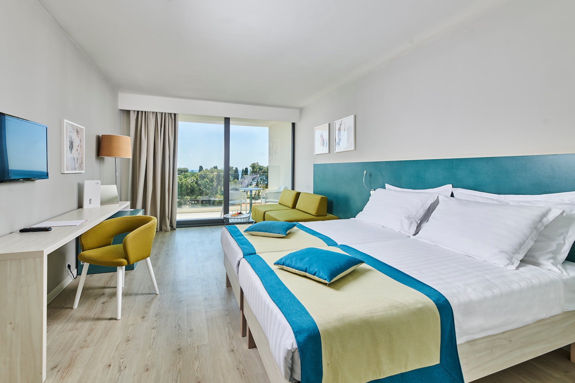 a room with a bed and a desk