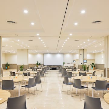 a room with tables and chairs