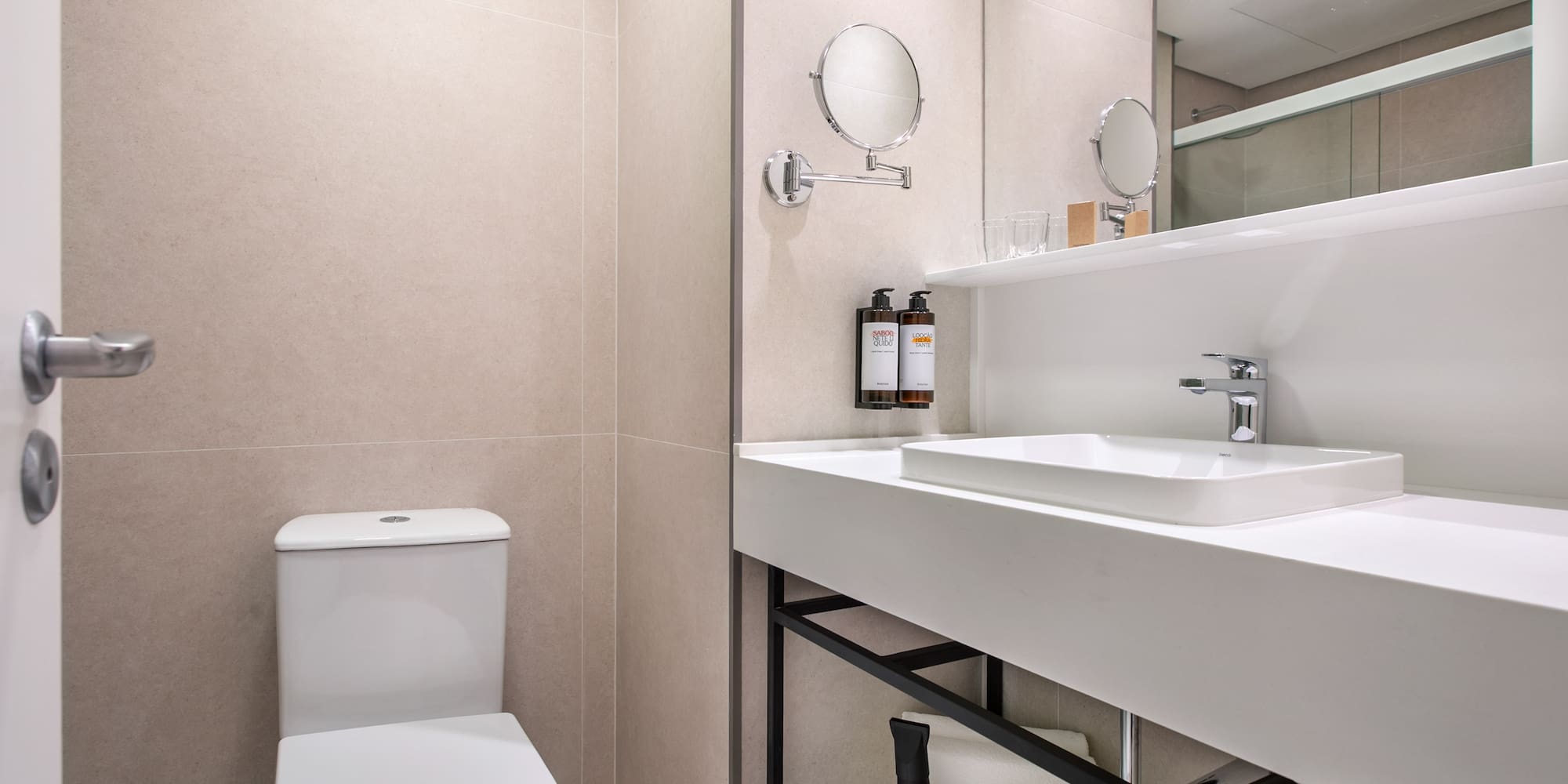 a bathroom with a sink and mirror