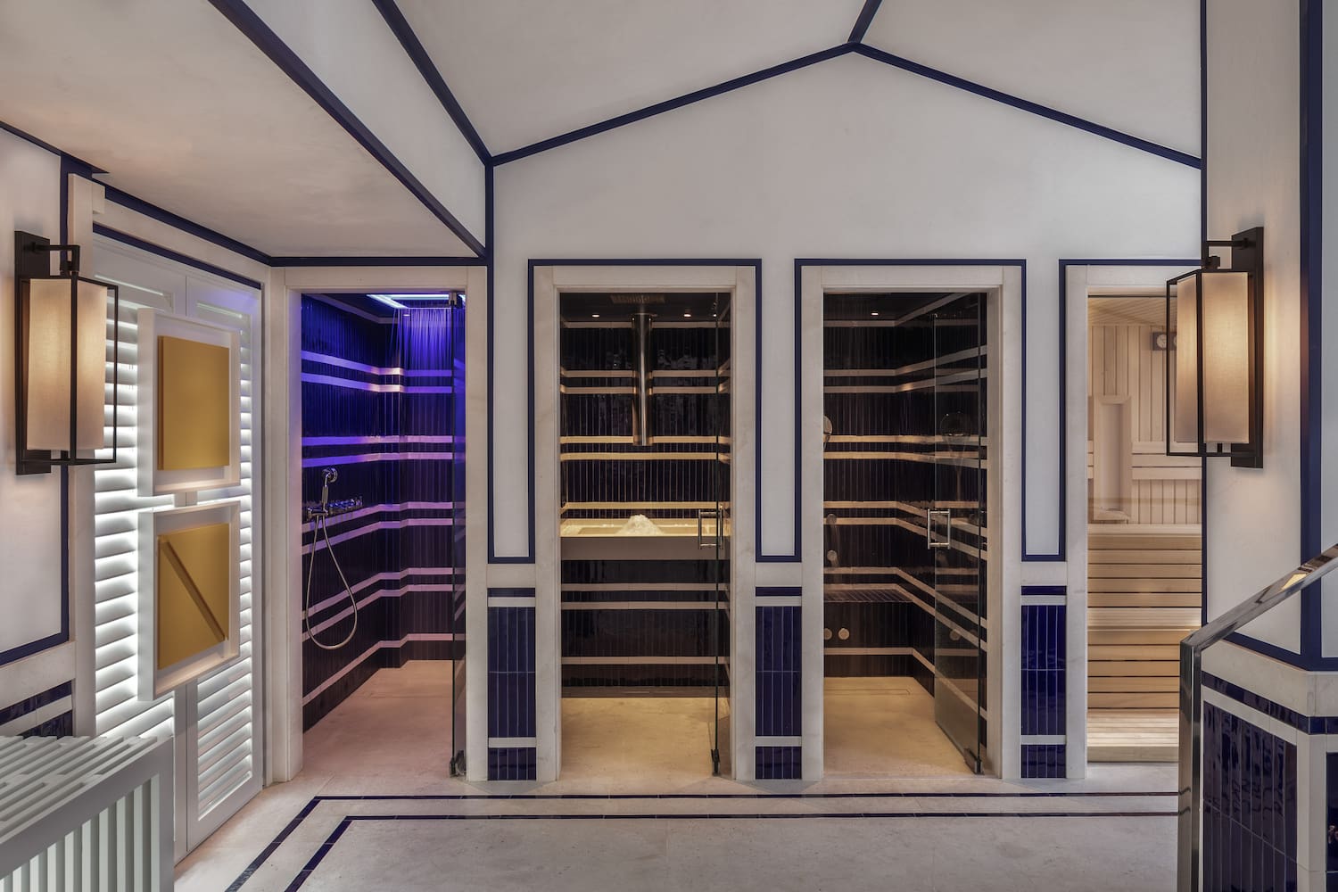 a room with a sauna and shower