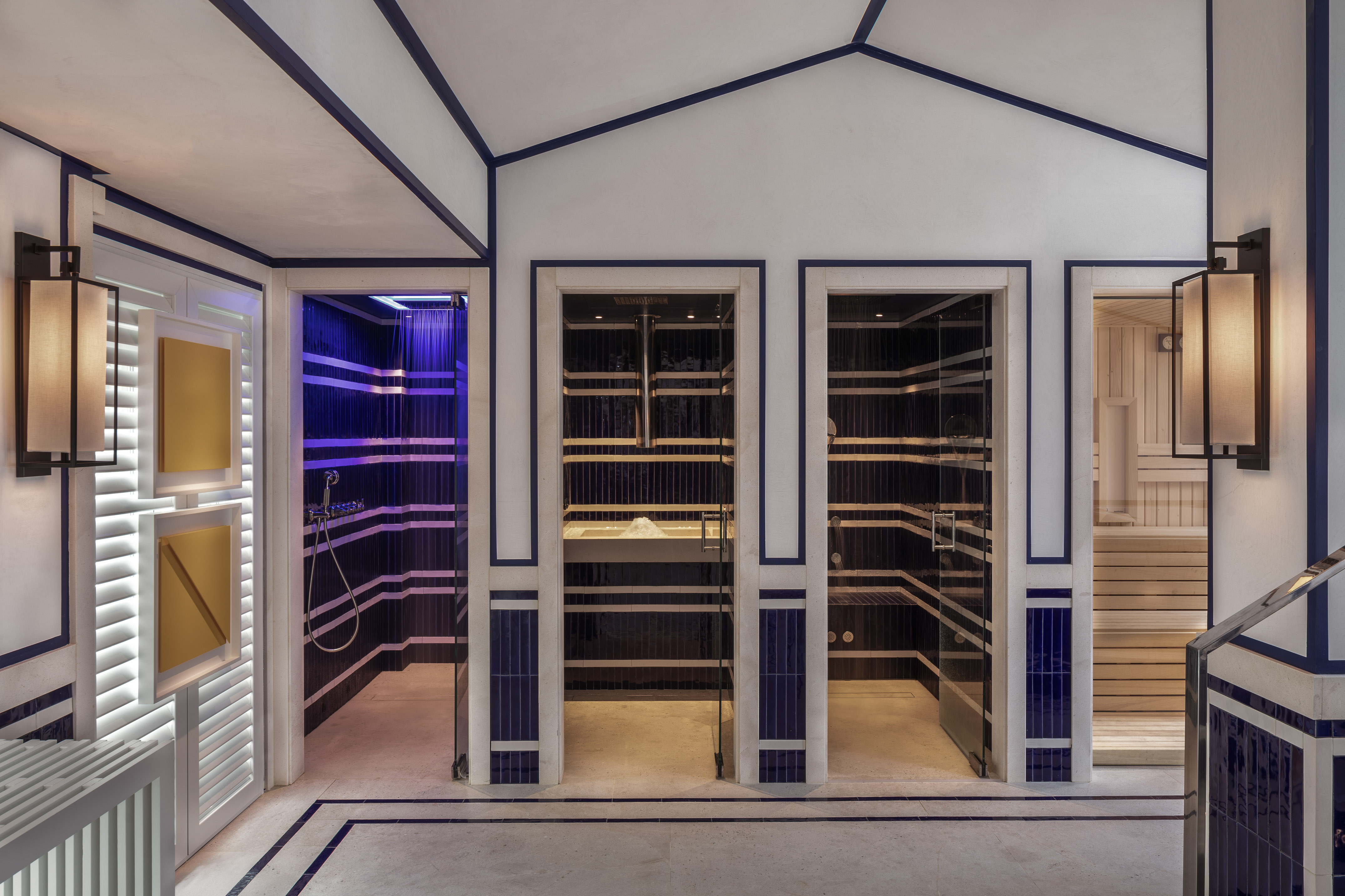 a room with a sauna and shower