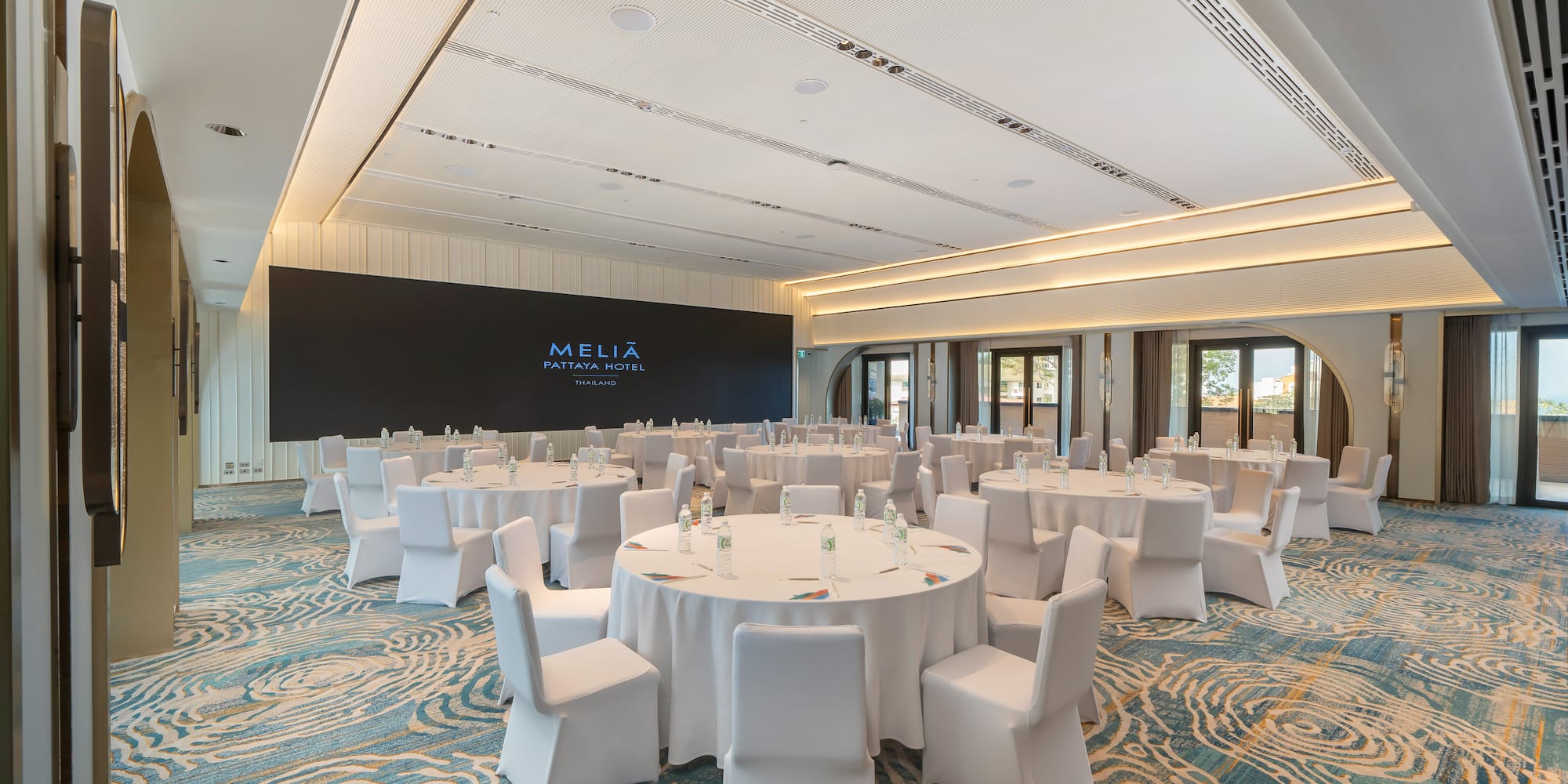 a room with tables and chairs