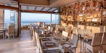 a restaurant with tables and chairs