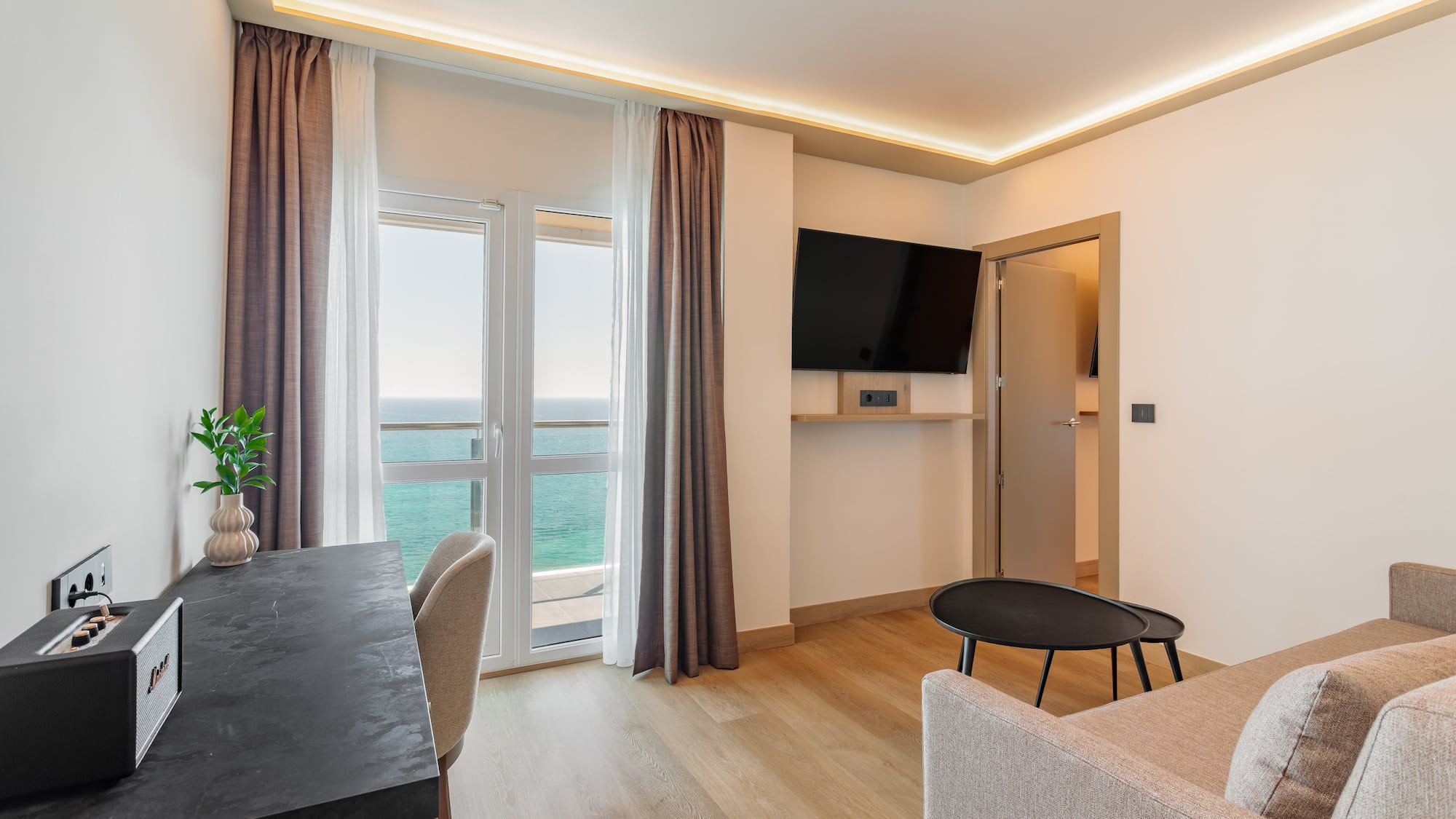 a room with a television and a table