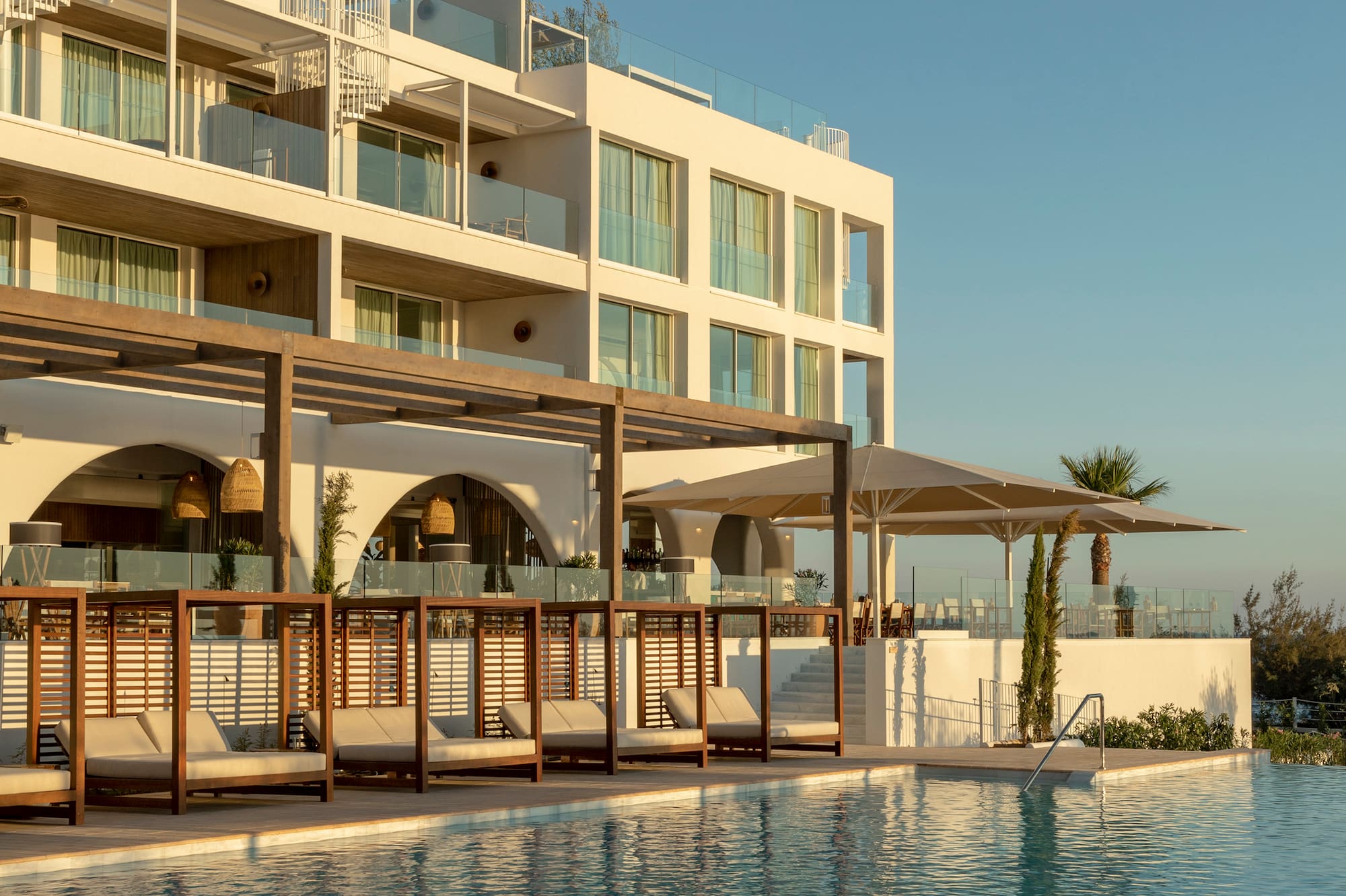 a pool with a building in the background